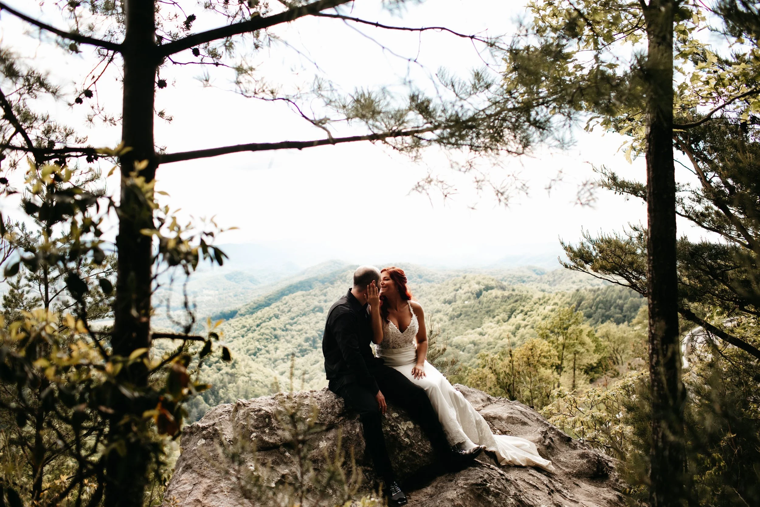 foothills-parkway-couple-on-rock-overlooking-mountains.jpg
