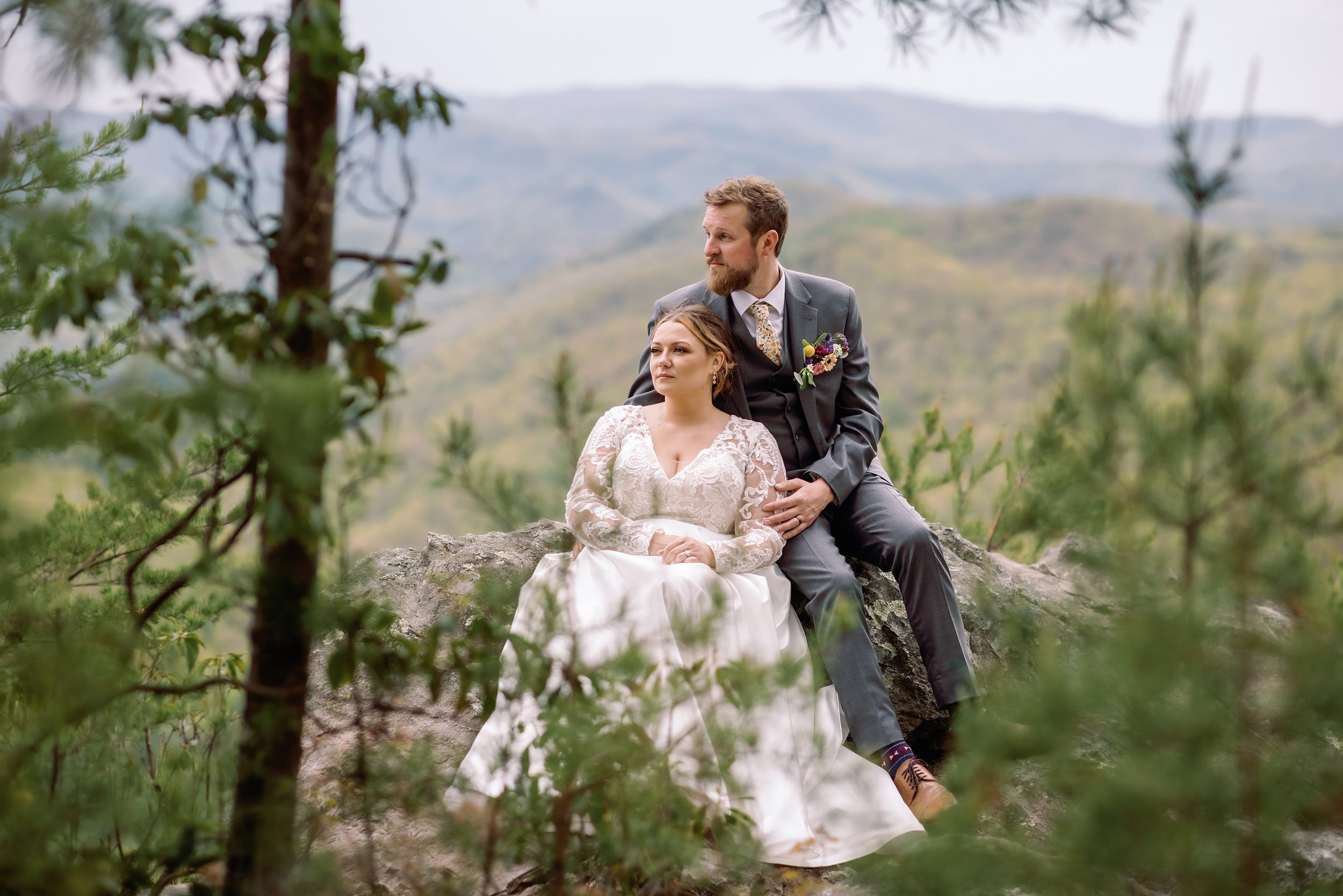 foothills-parkway-effortless-elopements-sitting-on-rock.jpg