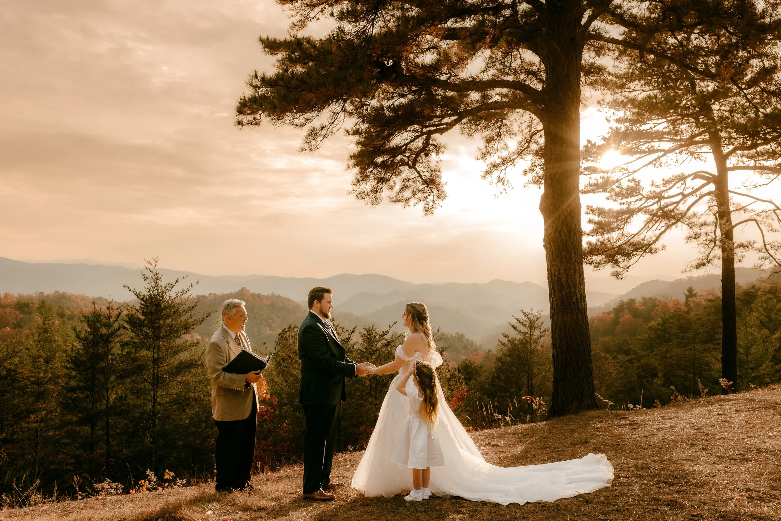 Elopement ceremony at sunset on the Foothills Parkway with a mountain view