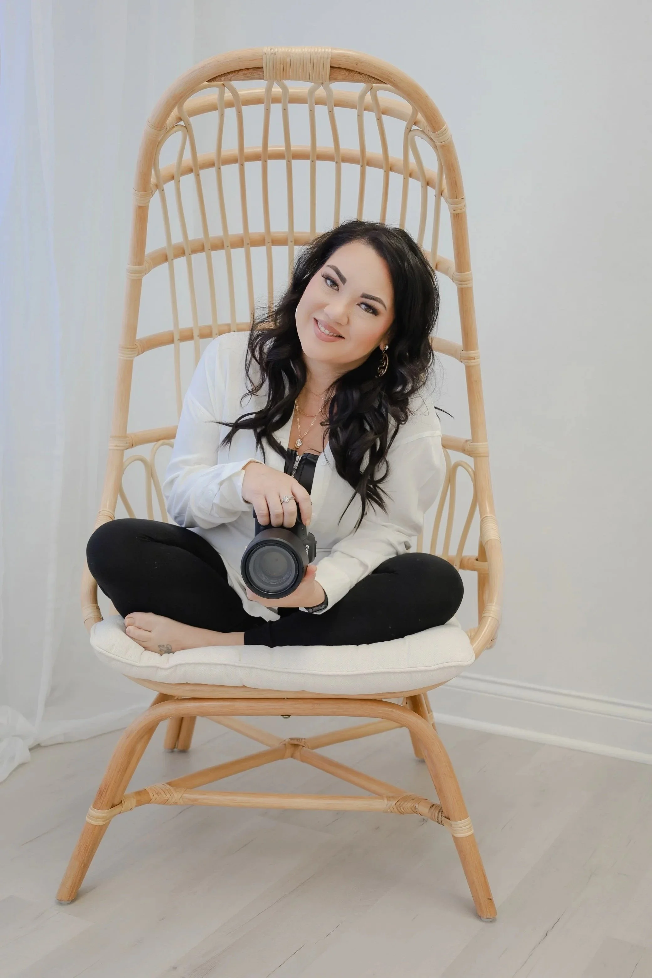 Girl holds camera for headshot