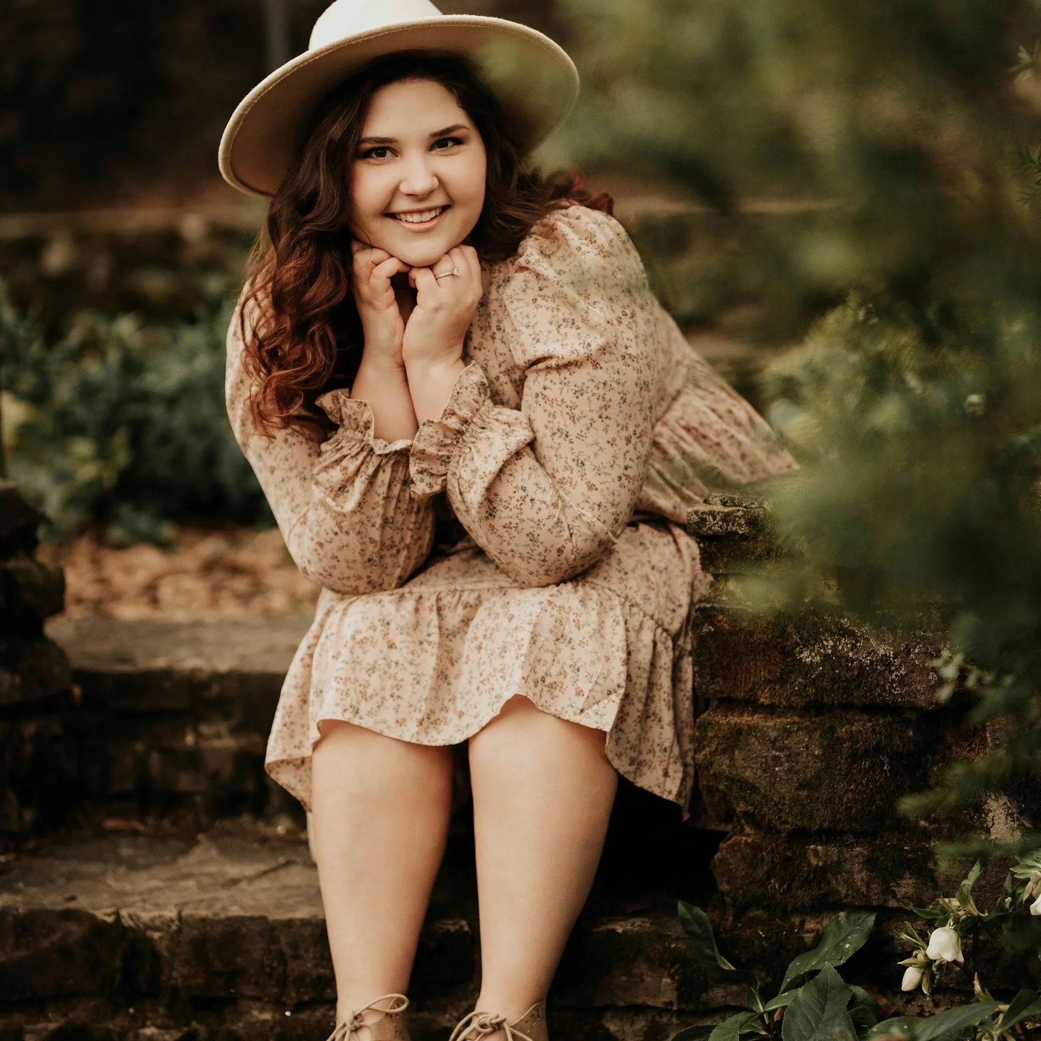 Girl posing with chin on hands