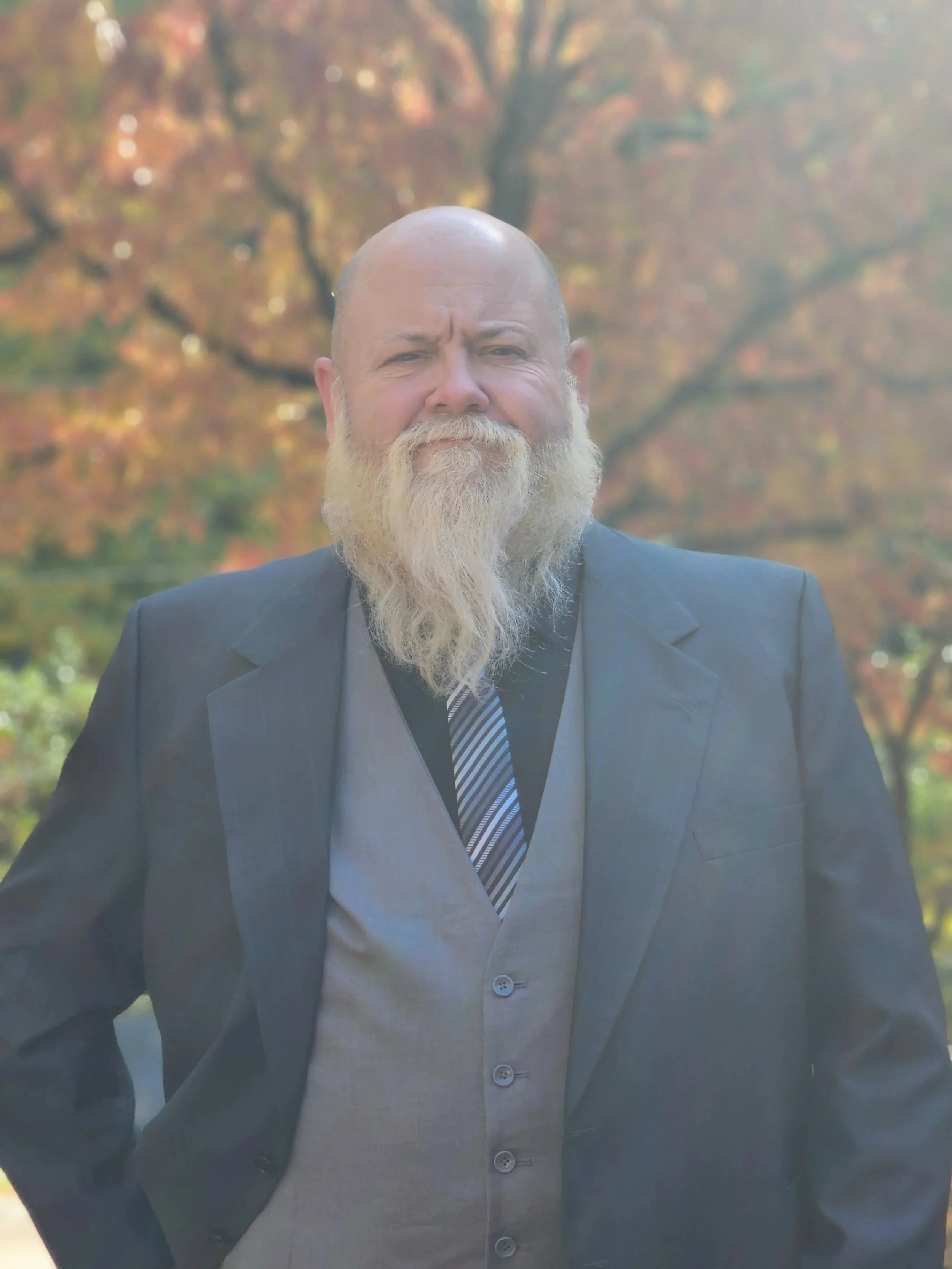 Bearded man looking at camera