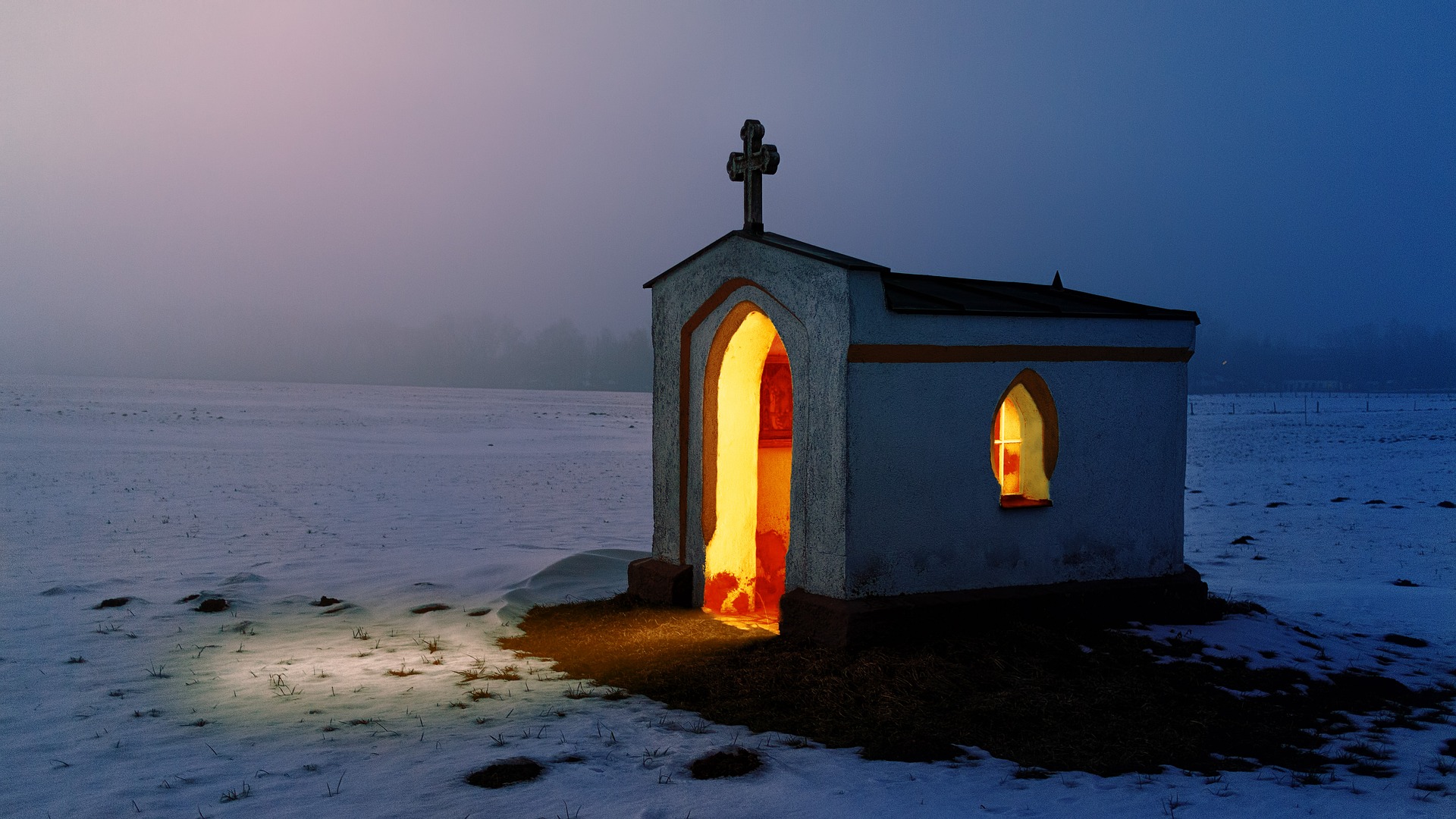 warm bright church isolated winter landscape