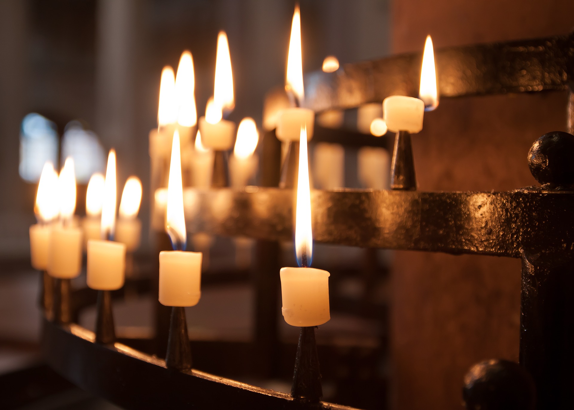 votary candles lit church