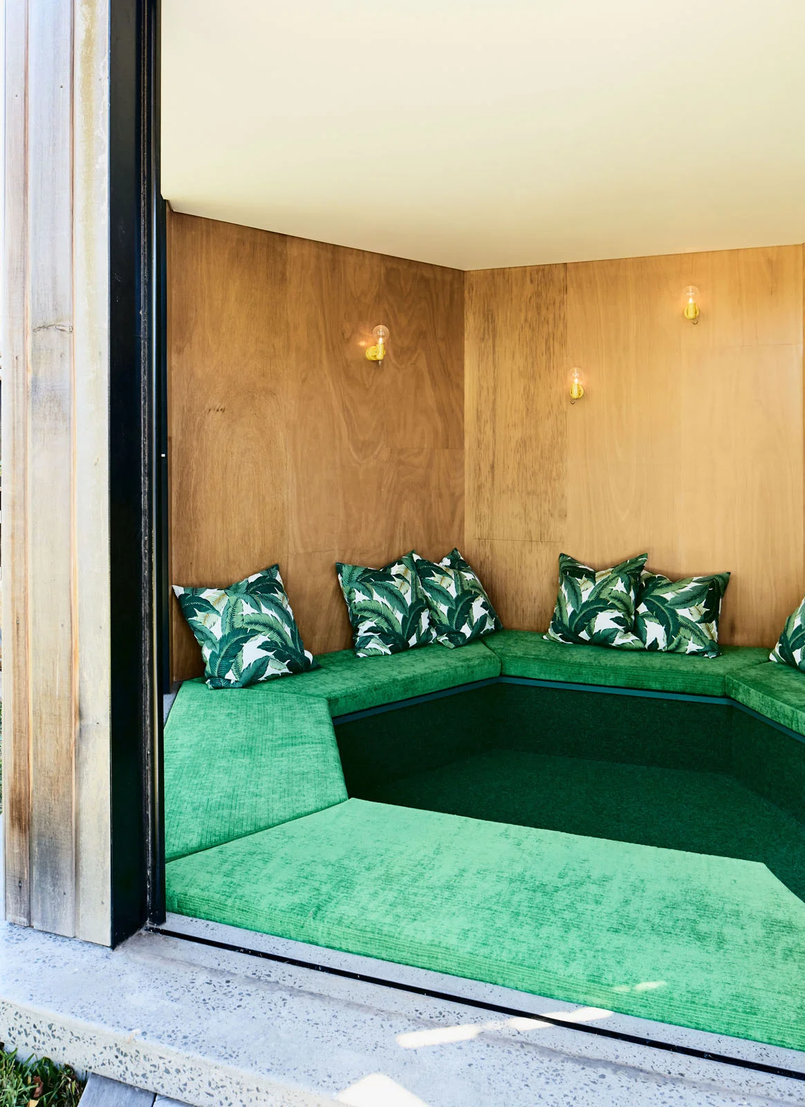 surprising green interior to hexagonal outdoor room