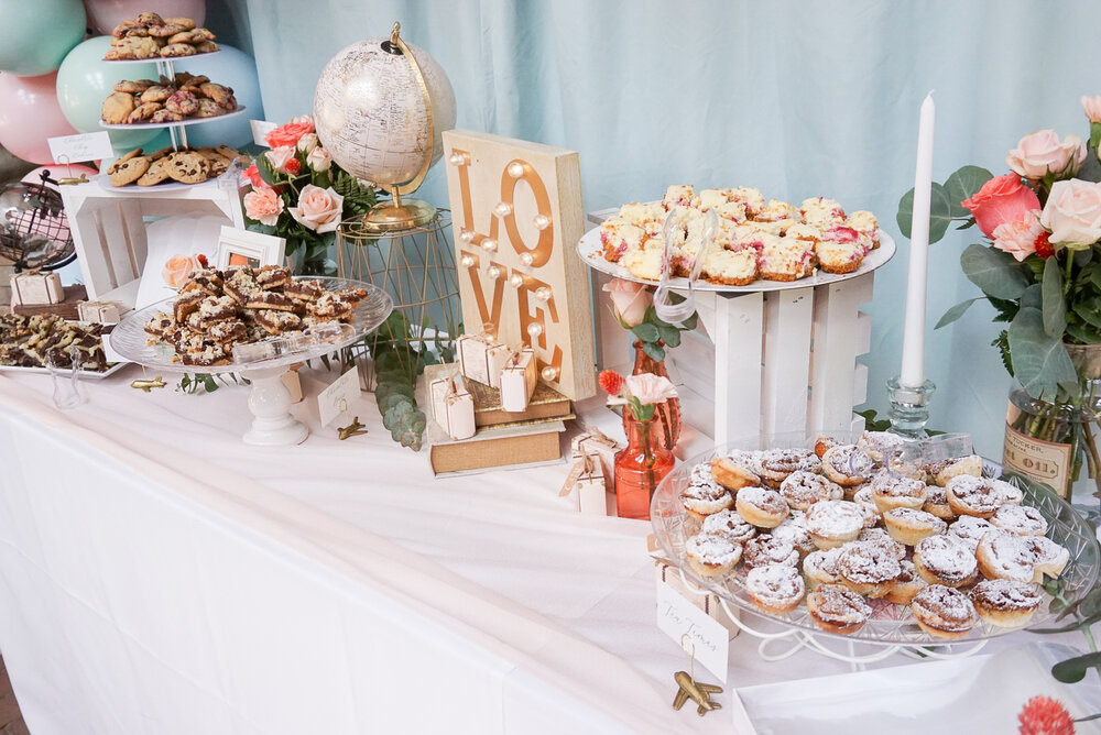 setting up a bridal shower dessert table