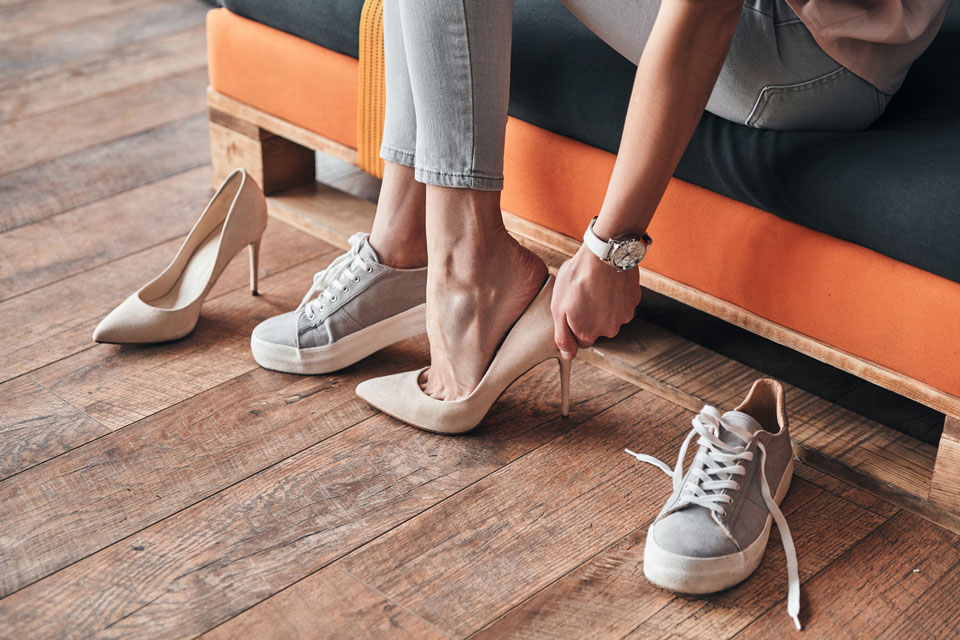 woman-putting-on-her-shoes.jpg