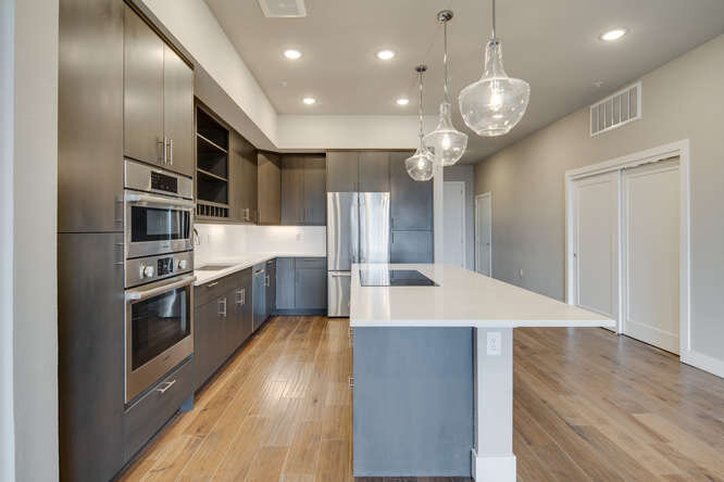 6619 E Lowry Blvd 306 Unit 306-small-002-046-Kitchen 1 RET-666x444-72dpi.jpg