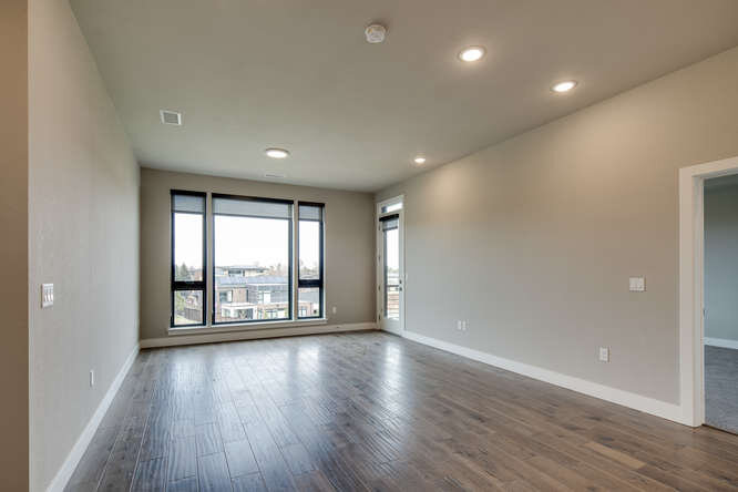 6619 E Lowry Blvd 306 Unit 306-small-016-014-Living Room3-666x444-72dpi.jpg