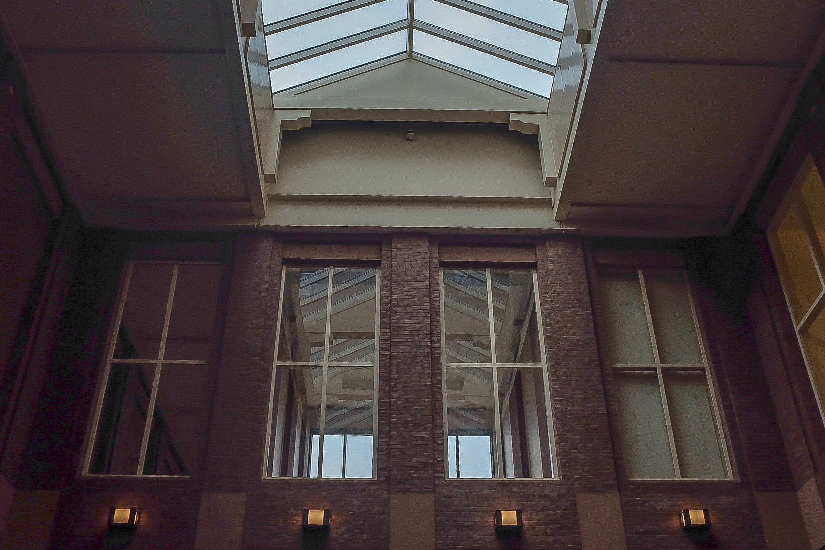 March 21,2019. Trying to capture some interior architecture with difficult lighting. The sky was much brighter. Exposed for highlights and lifted shadows. Seeing the limits of dynamic range befor trying bracketing in post.