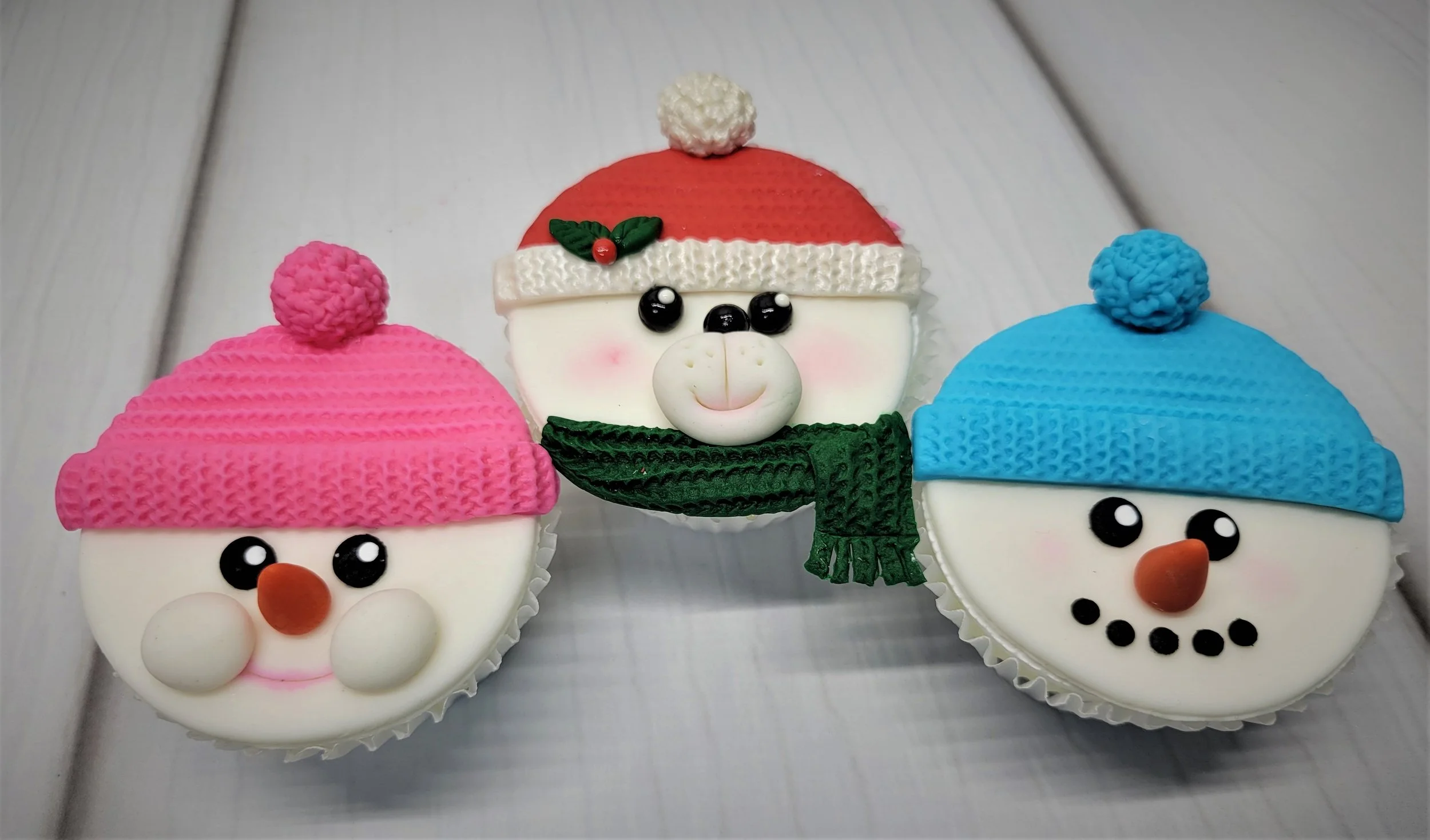 Polar bear and snowman face cupcake topper