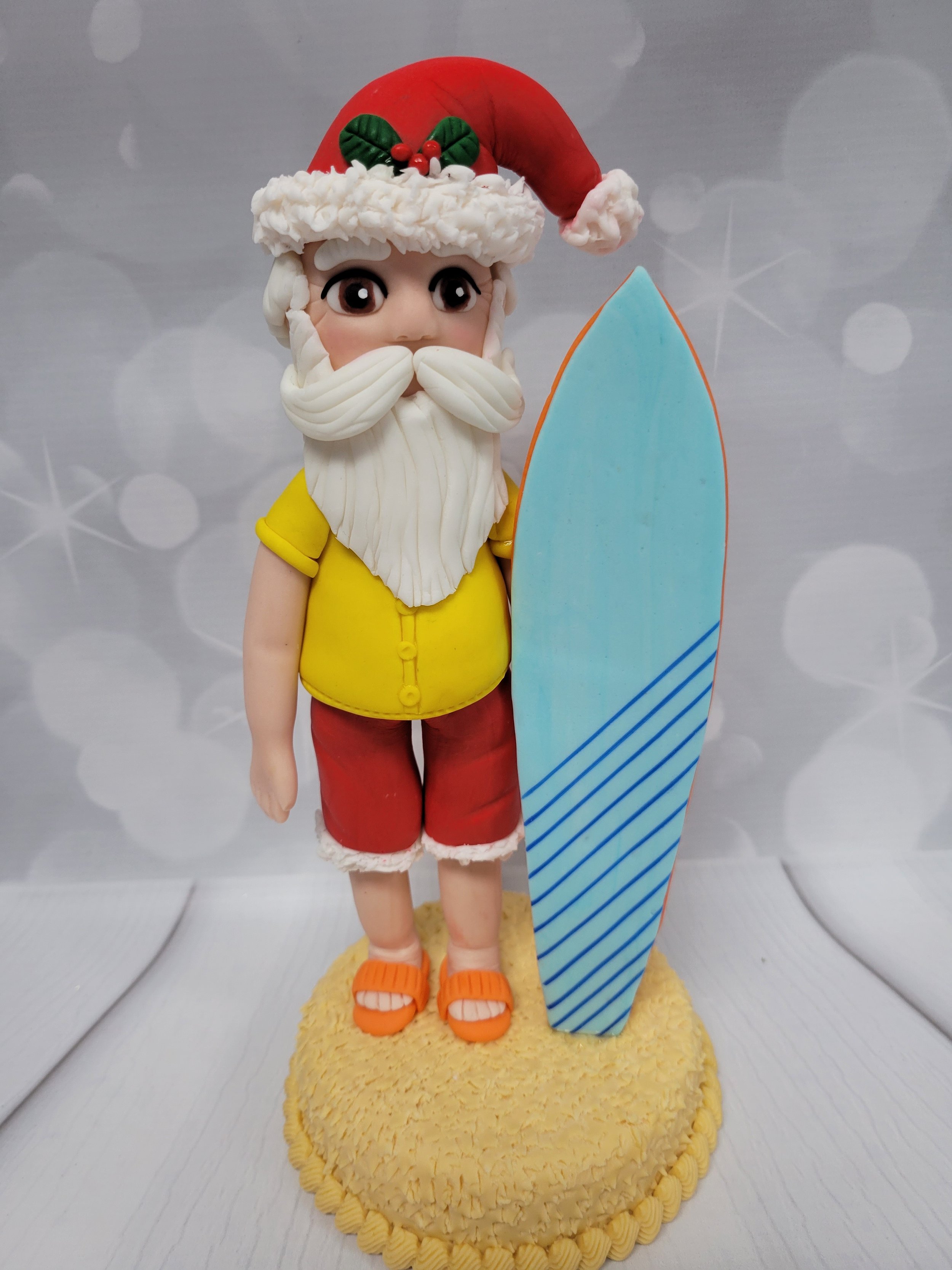 Tropical Santa with a surfboard