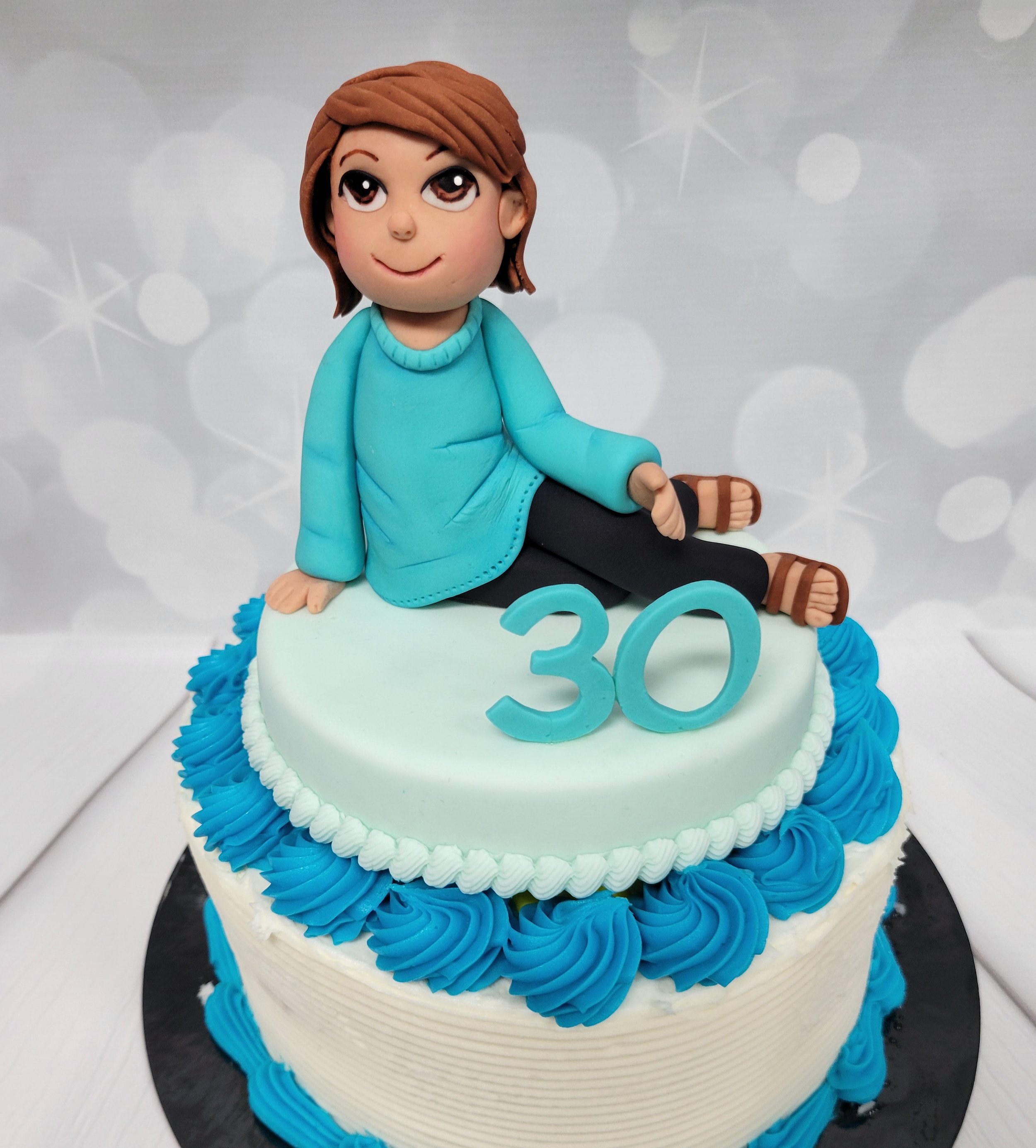 Lady sitting cake topper for 30th birthday