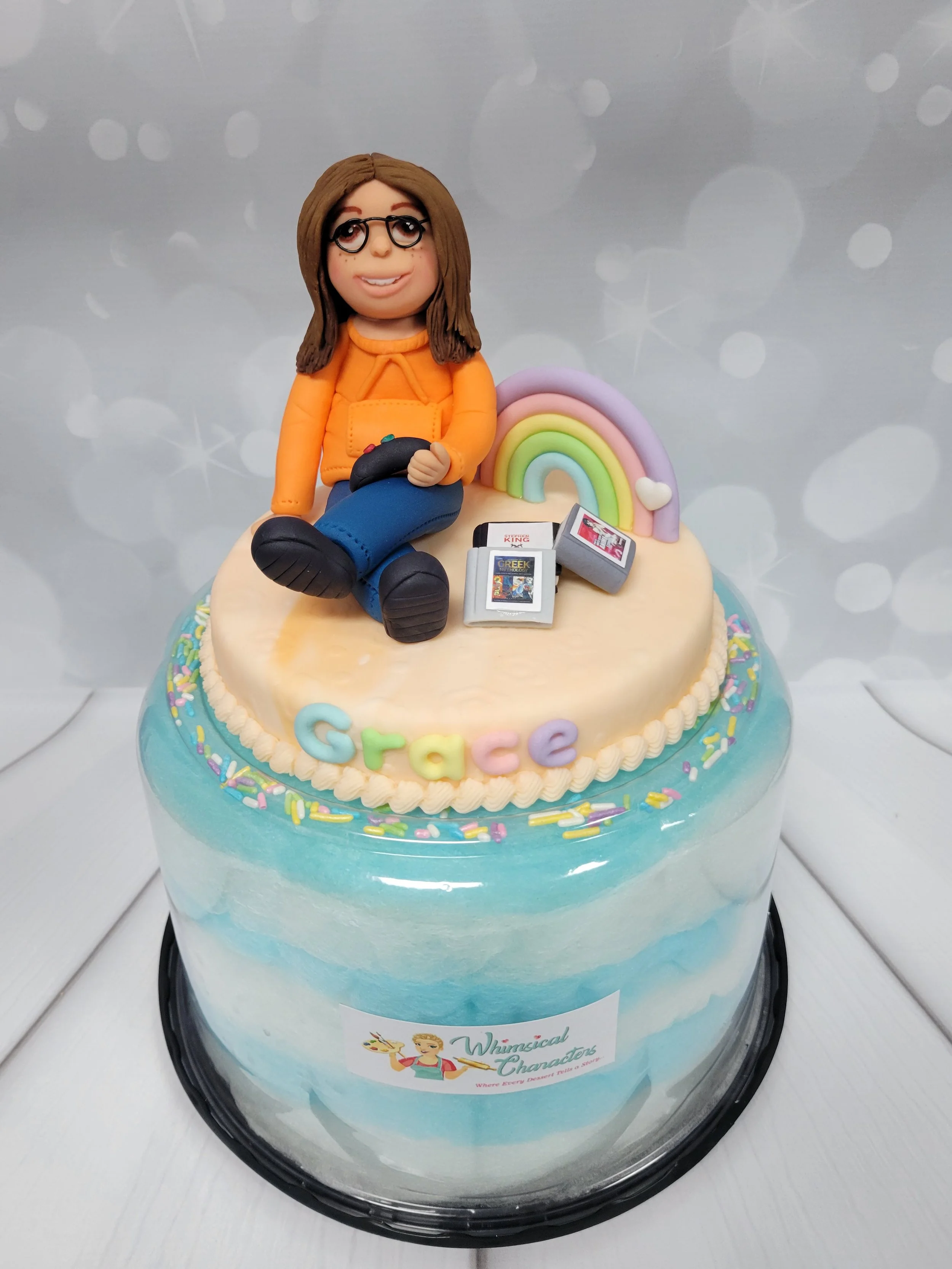Cotton candy cake for a girl named Grace who loved video games, reading, hoodies and rainbows