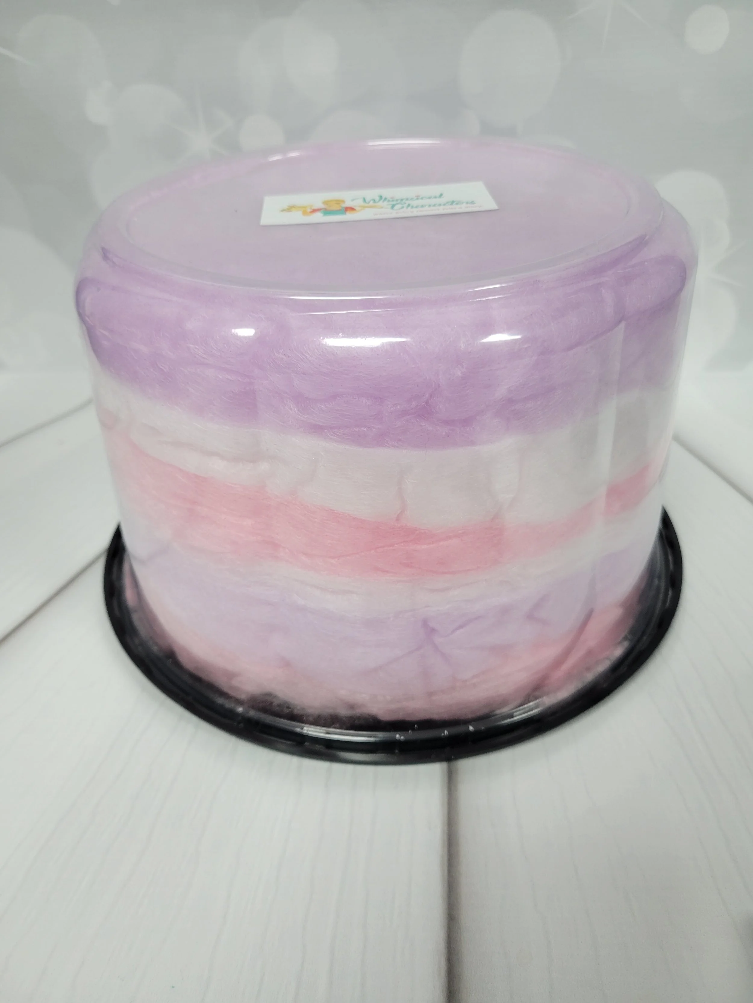 Cotton candy cake with no sprinkles.  Three different flavours