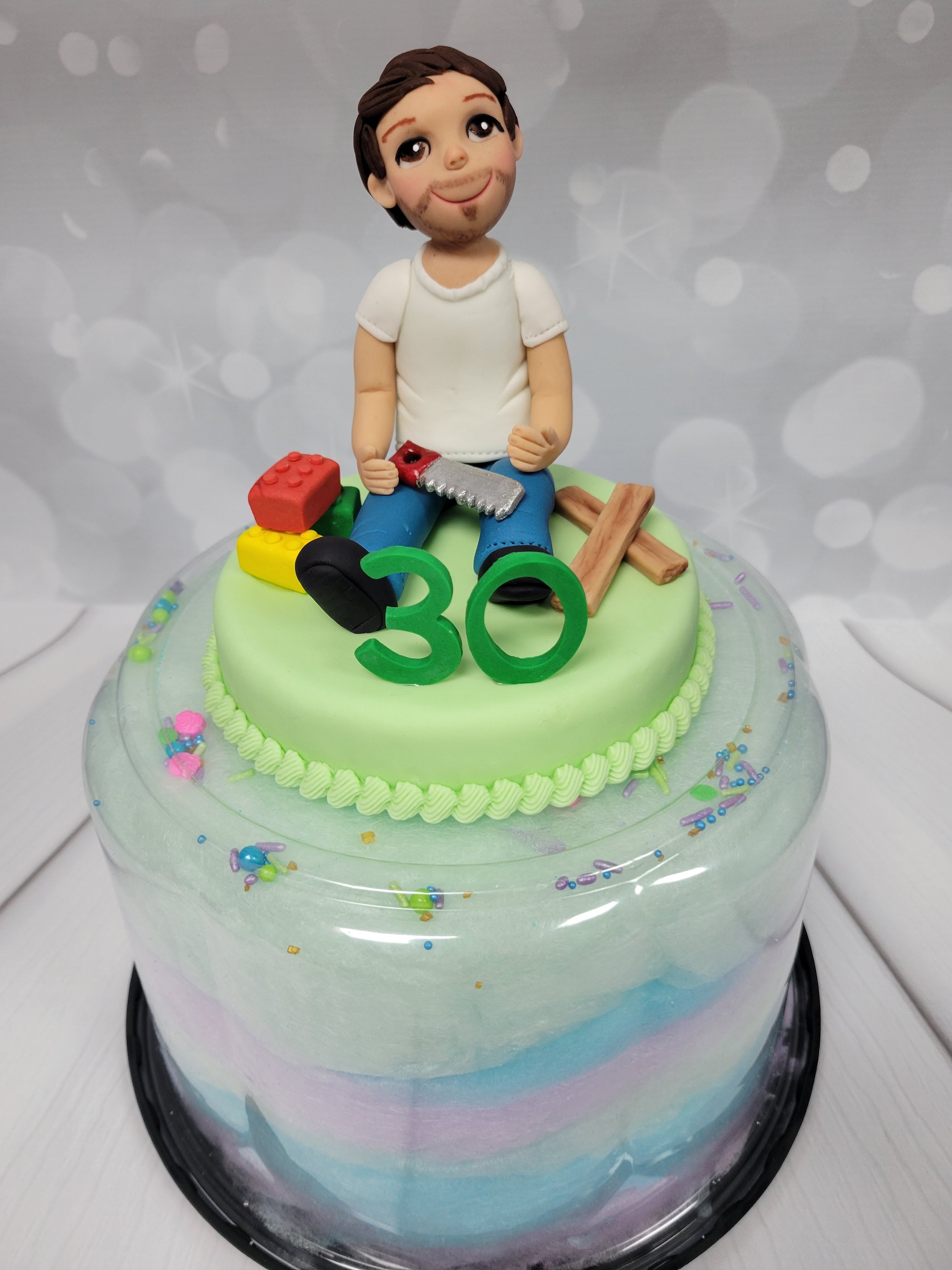 Male character on a cotton candy cake