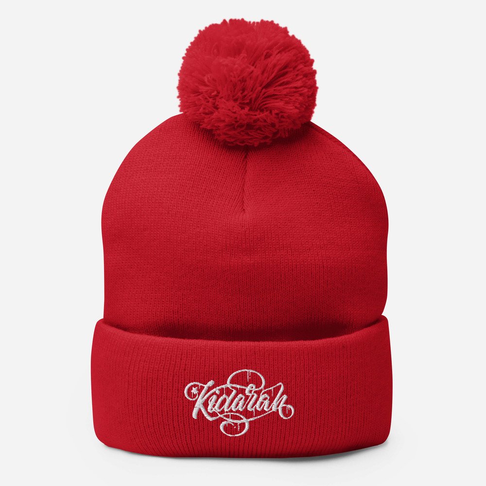 pom-pom-knit-cap-red-front-6197f6f7396a2.jpg