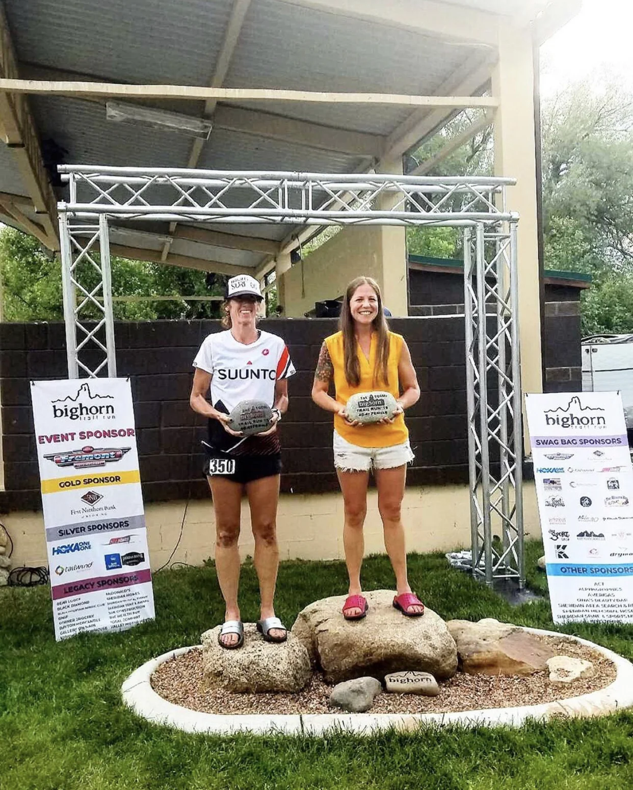 Tara wearing her 100 mile podium kicks - Oofos recovery sandals