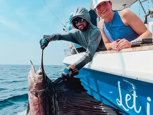 Captain Noah with a billfish in Tamarindo costa rica