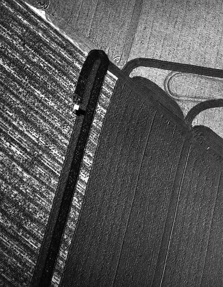 William Garnett  “Tractor Plowing Field, Arvin,, CA, 1951”  11”x14” silver gelatin print  Signed in pencil on recto. Stamped, titled, dated on verso.