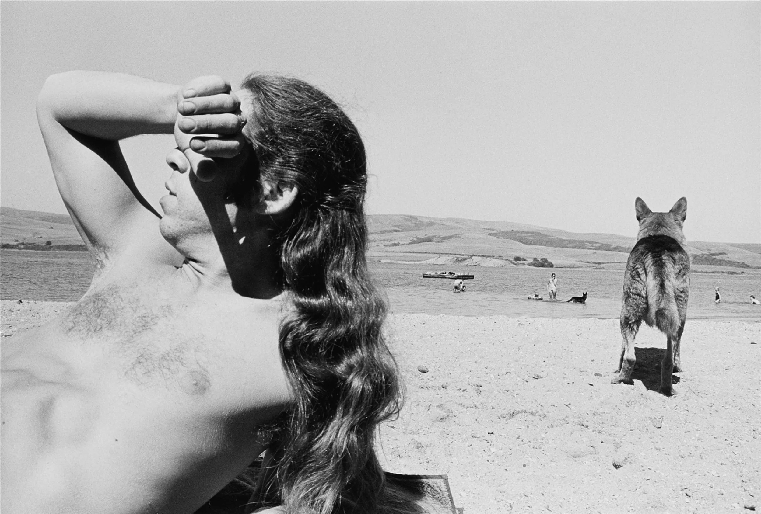Henry Wessel  Untitled (Beach), 1973  11”X14” silver gelatin print  Signed in pencil on verso