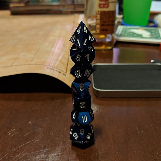 The first ever stack of my first ever D&amp;D dice set ( @mistymountaingaming )! I got them for Father's Day from my kids.  Hopefully l stay sober enough for their inaugural campaign! 
#DungeonsAndDragons #NerdsNightOut
#DiceStacking #AboutToSmashSom