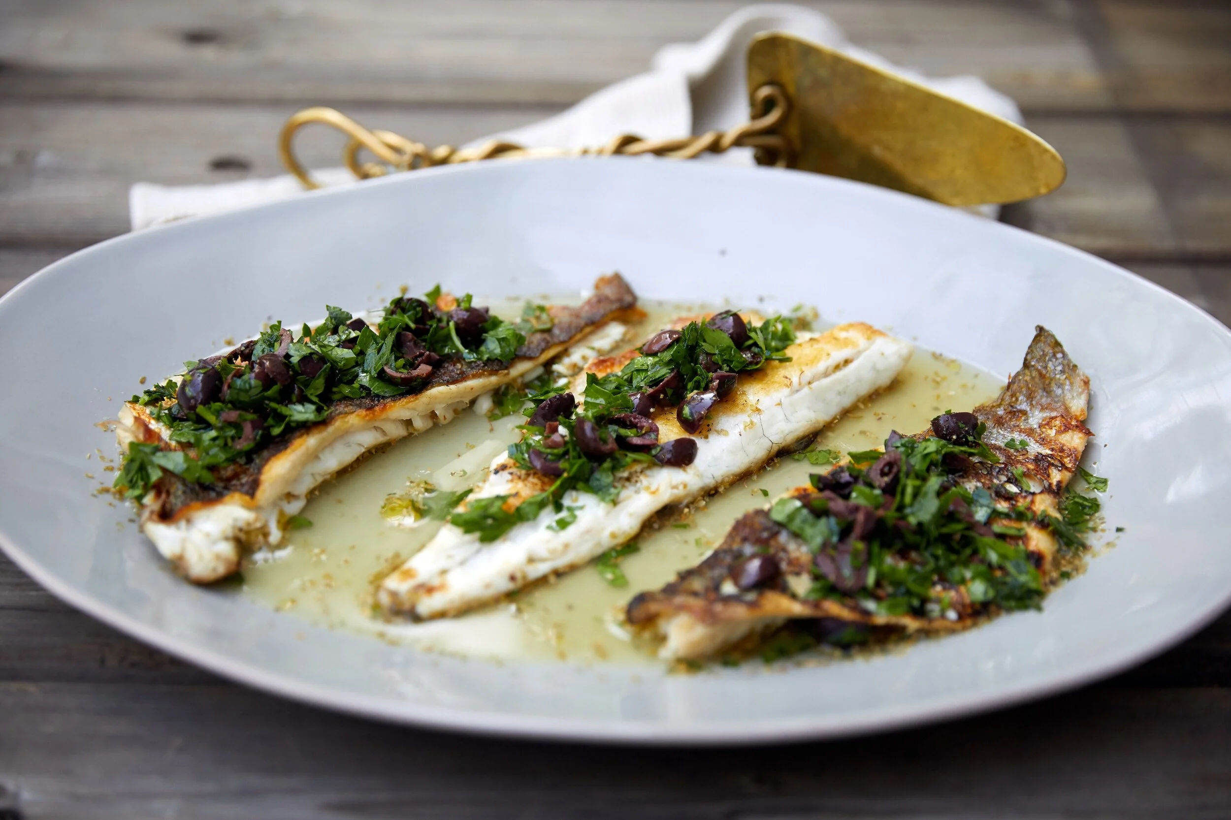 Grilled Branzino with Lemon and Olives