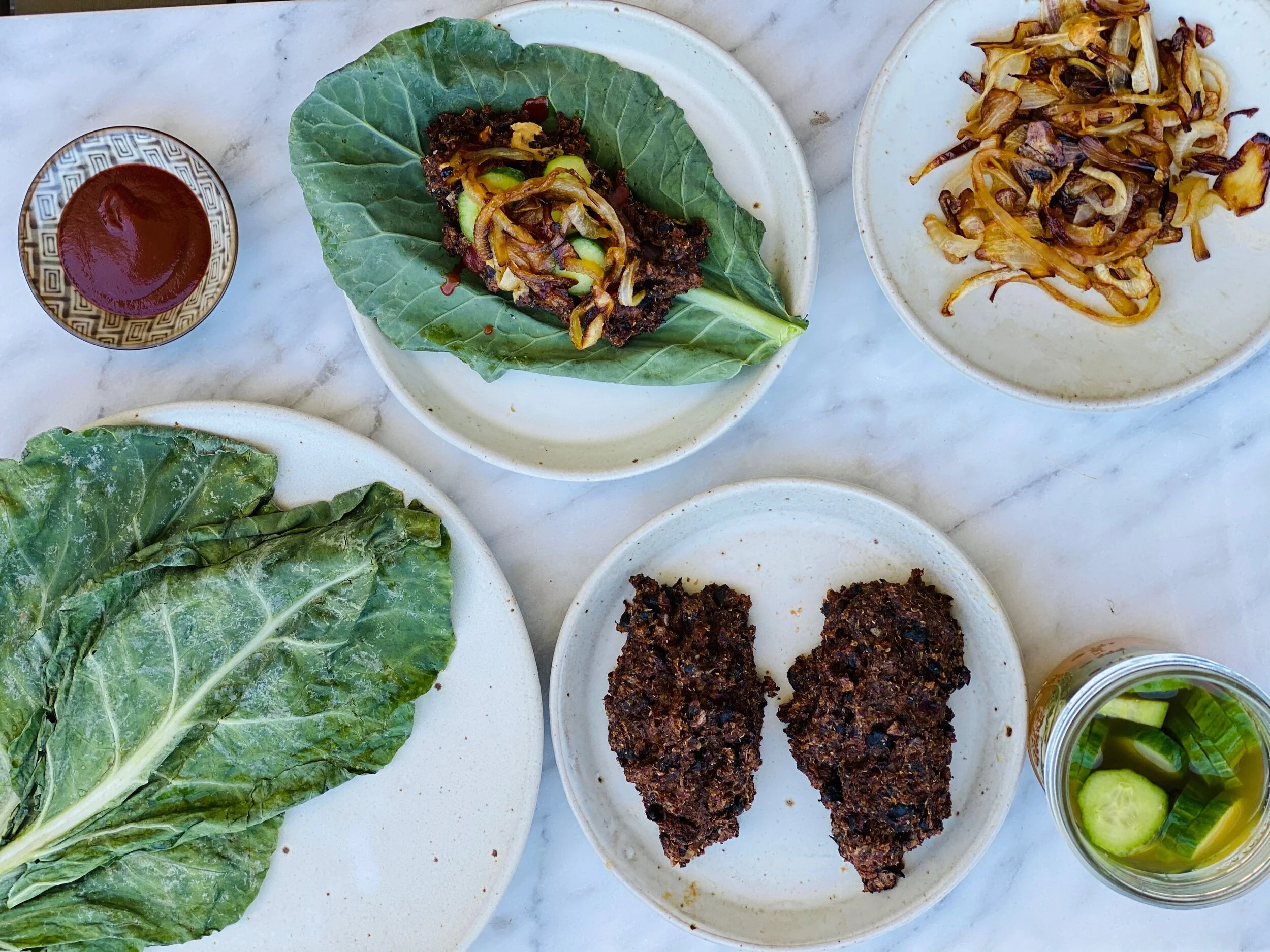 Vegan Black Bean Burgers with Probiotic Pickles and Caramelized Onions 
