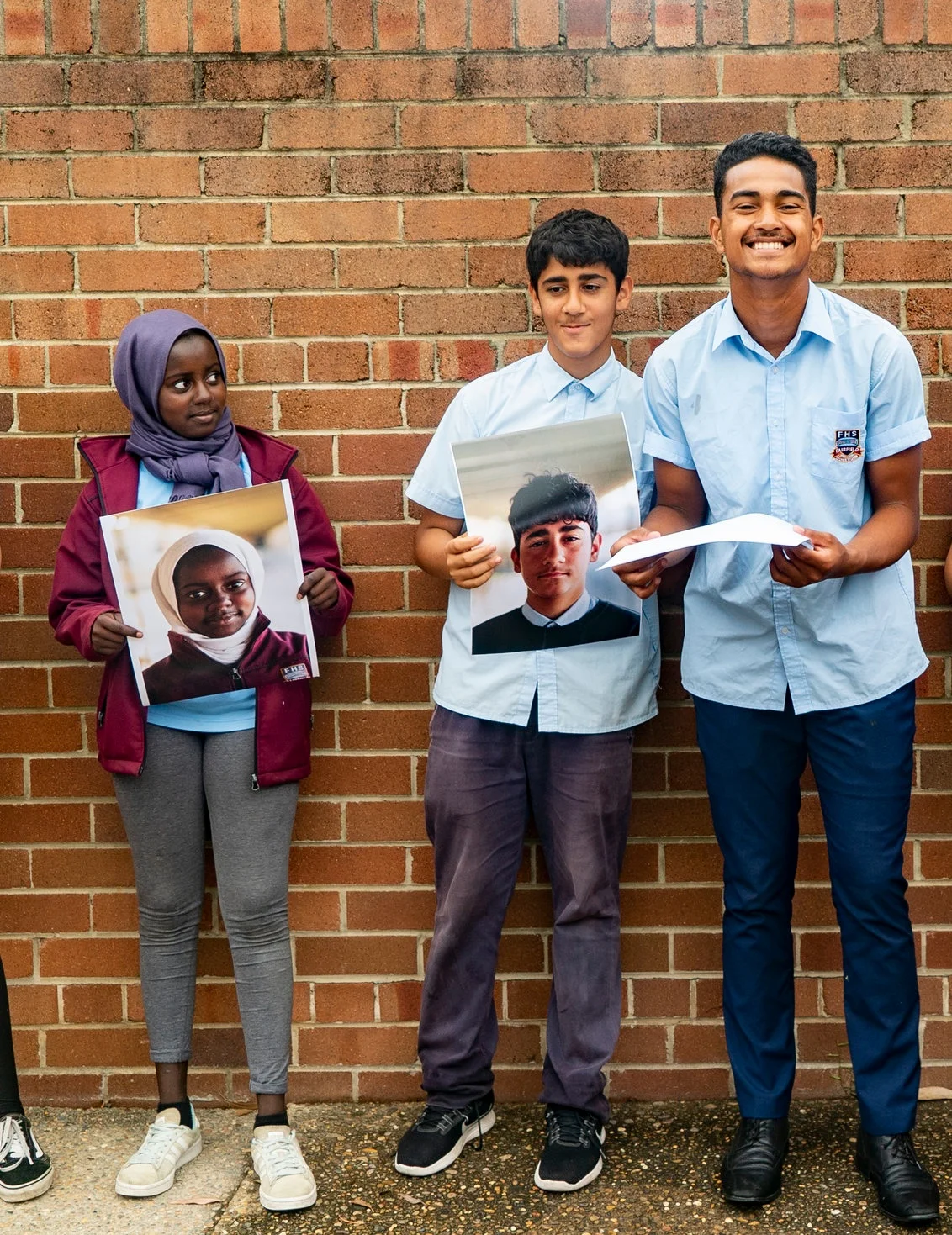 Students from Fairfield High School celebrating the completion of Story Factory’s ‘Our Faces, Our Stories’ program.
