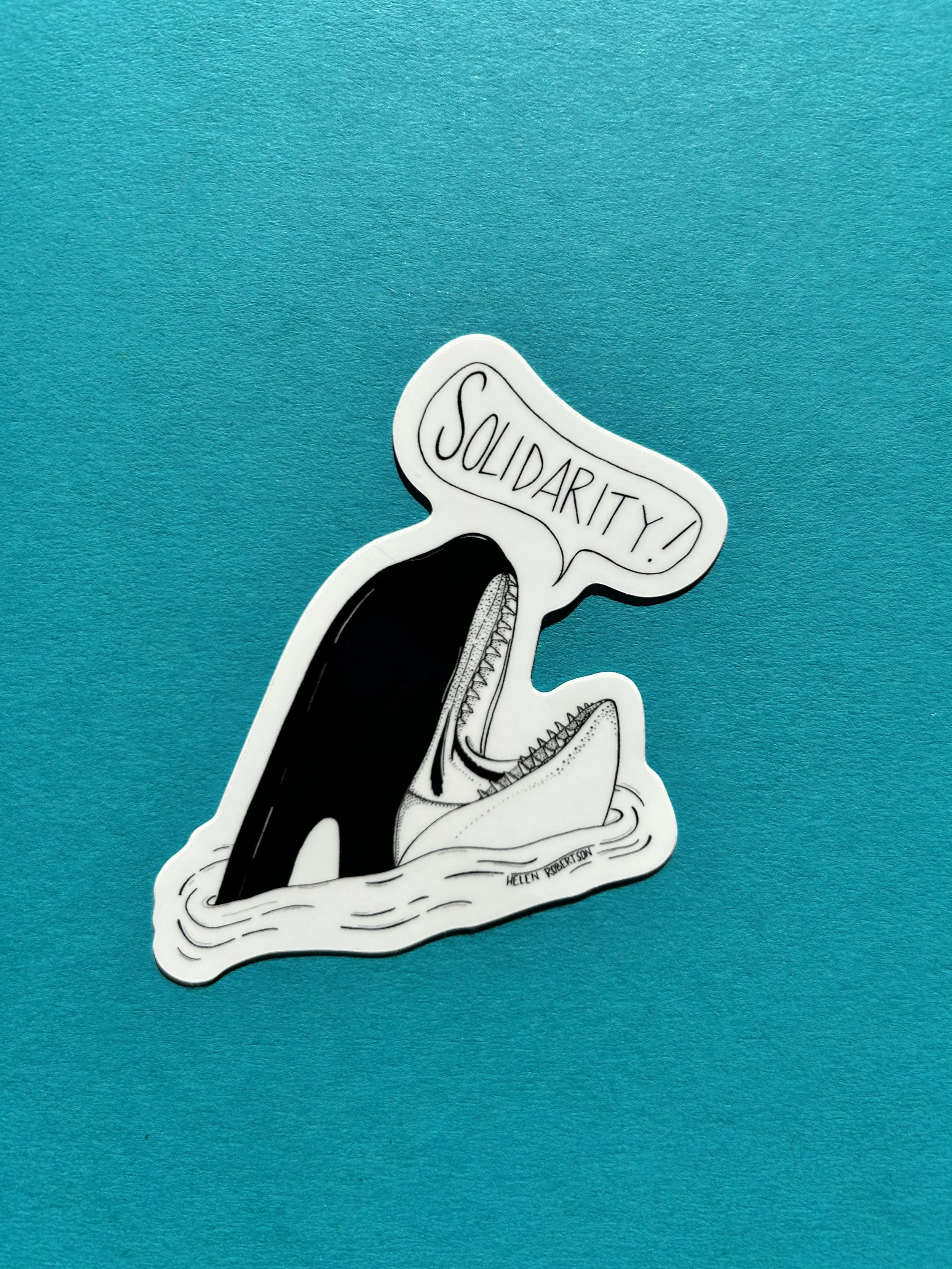 orca sticker blue background.jpeg