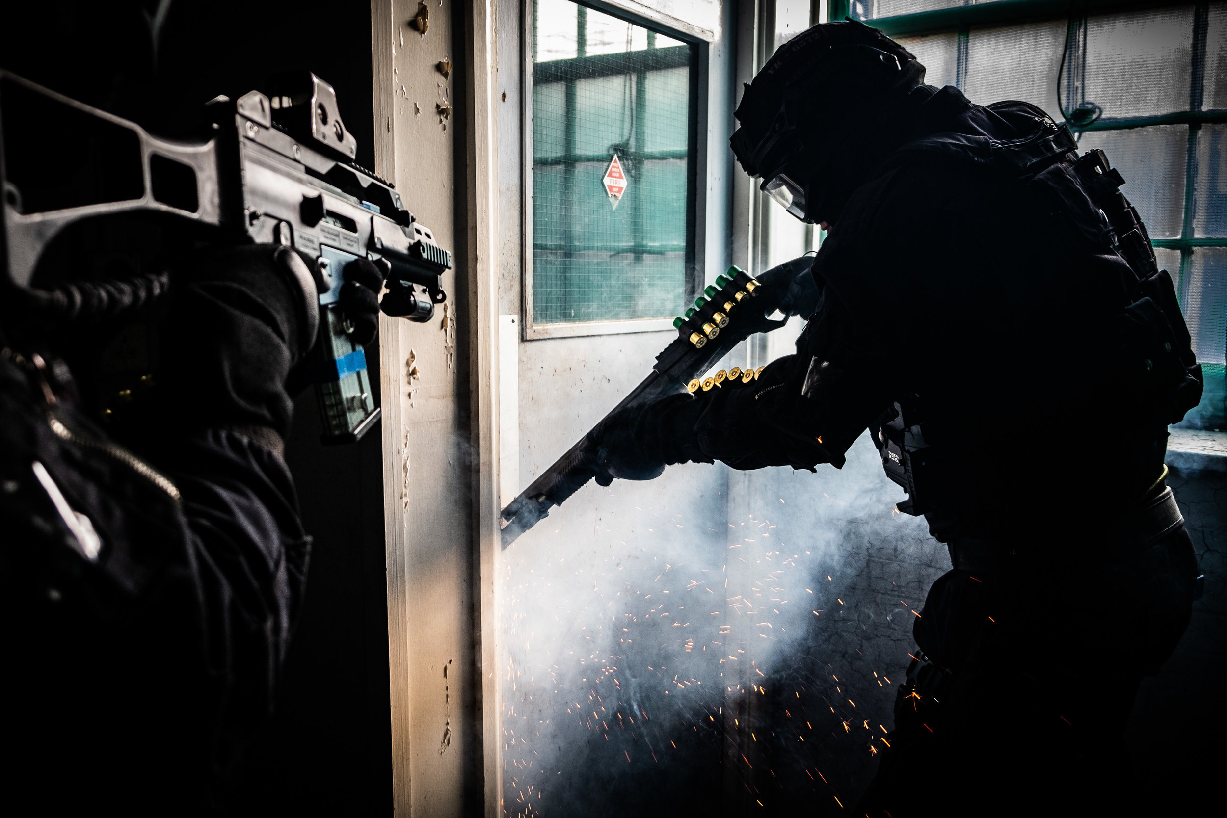  Armed police practice entry techniques by shooting the locks and hinges from doors. 
Photo by Jason Bye, 15 November 2018
 