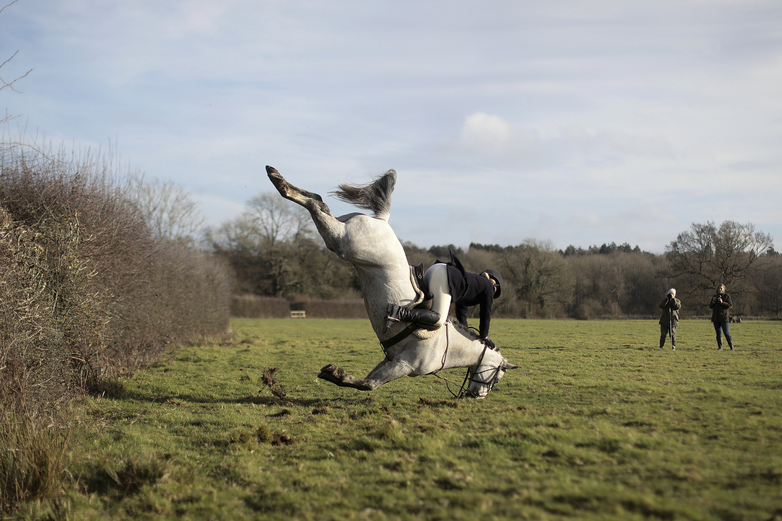  A member of the Old Surrey Burstow and West Kent Hunt crashes as she jumps a fence during the annual Boxing Day hunt in Chiddingstone.
Photo by Simon Dawson, 26 December 2017
 
