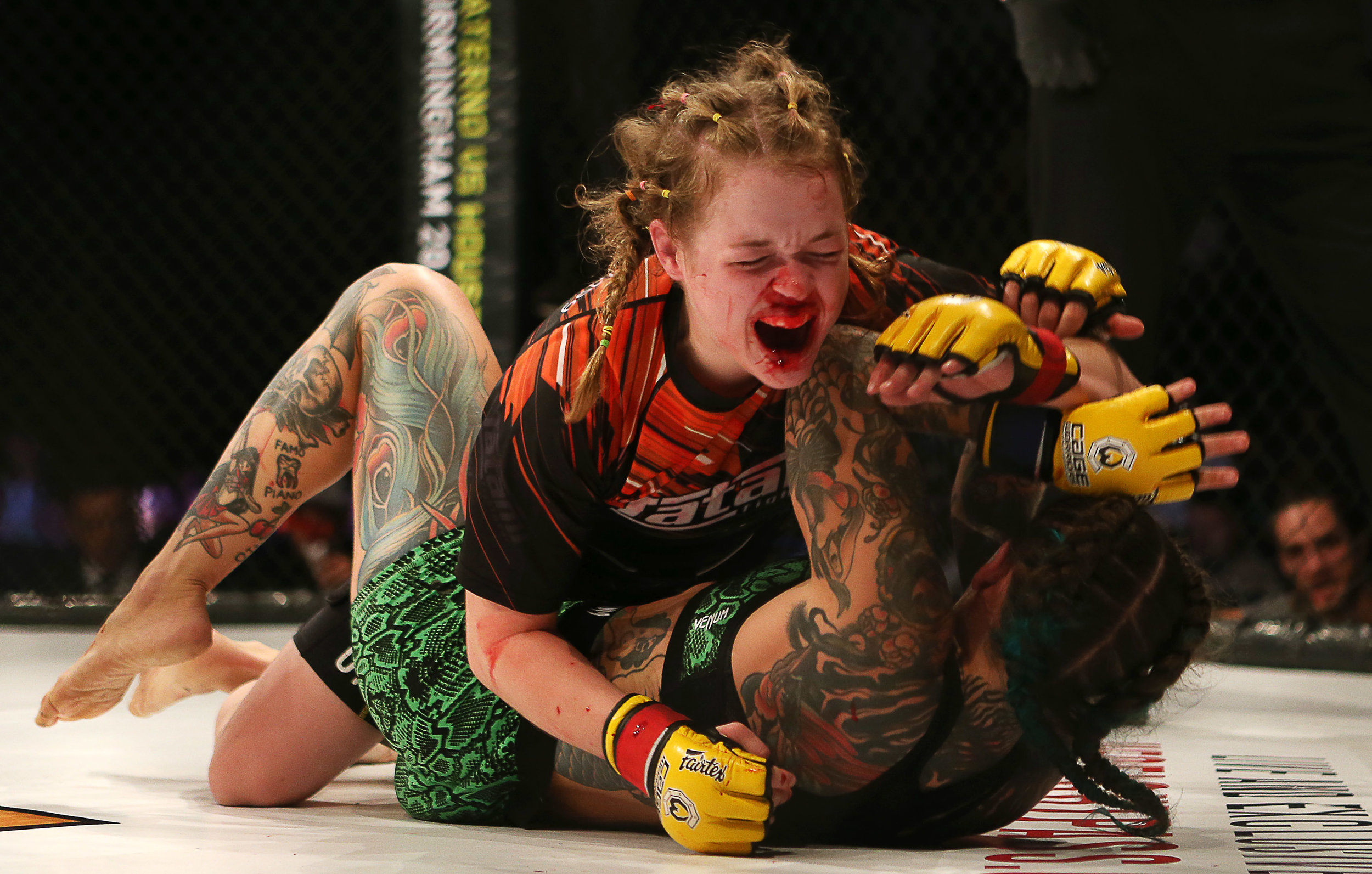  Wales' Cory McKenna (top) dominates Micol DiSegni during their fight at Cage Warriors 97 in Cardiff.
Photo by Chris Fairweather, 29 September 2018
 