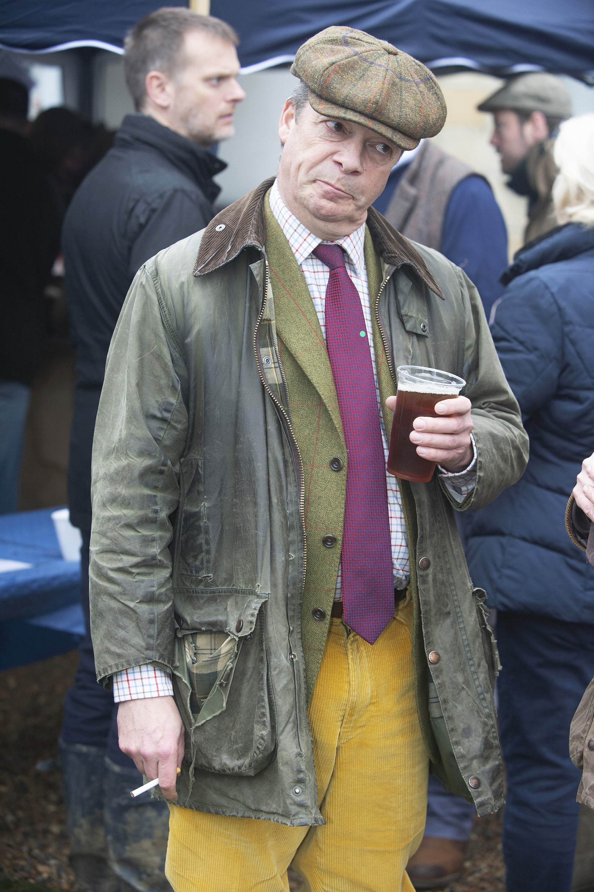  Nigel Farage enjoying an early morning beer and cigarette at the Old Surrey Burstow and West Kent Boxing day Hunt meet at Chiddingstone Castle.
Photo by Grant Falvey, 26 December 2018
 