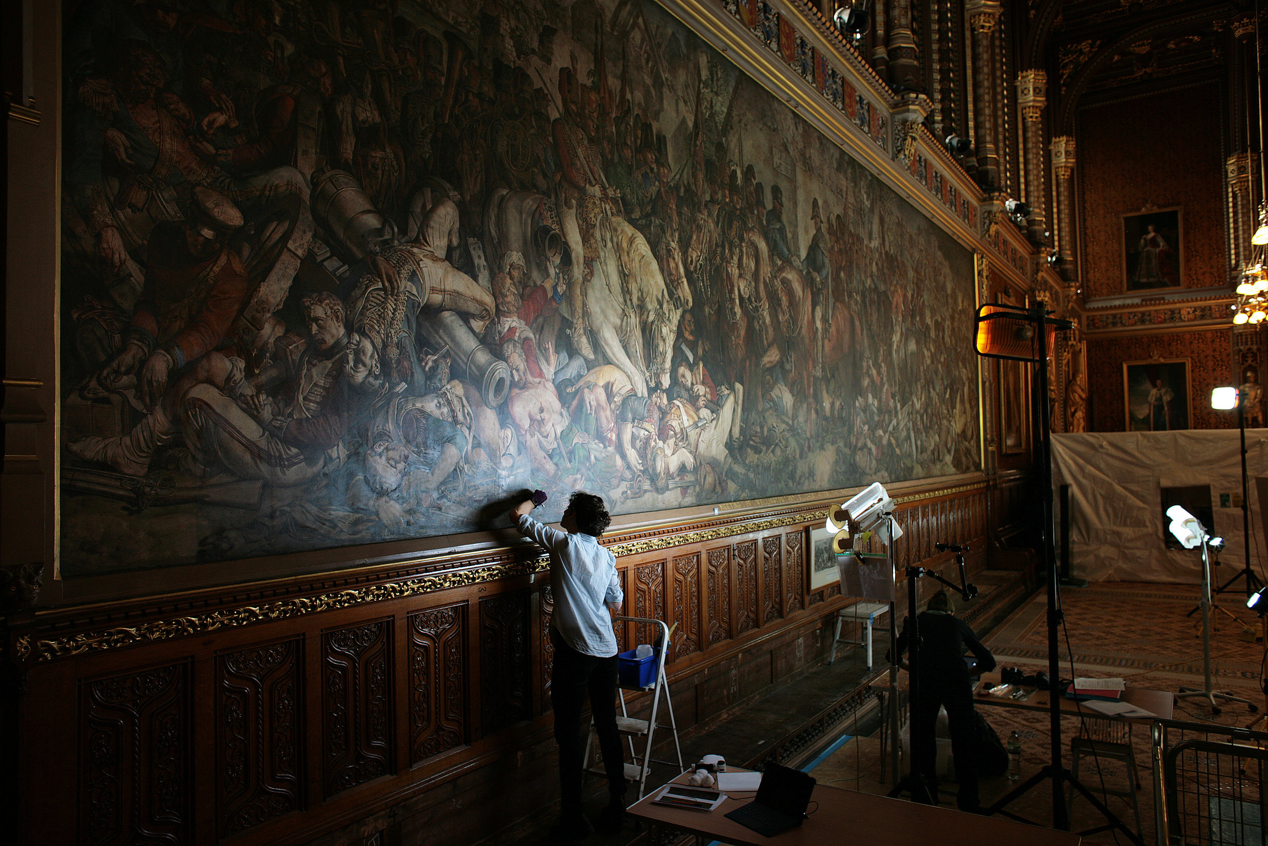  Conservators at The House of Lords working on Daniel Maclise�s murals �The Meeting of Wellington and Bl�cher after the Battle of Waterloo� and �The Death of Nelson at the Battle of Trafalgar�.
Photo by Martin Godwin, 19 April 2018
 