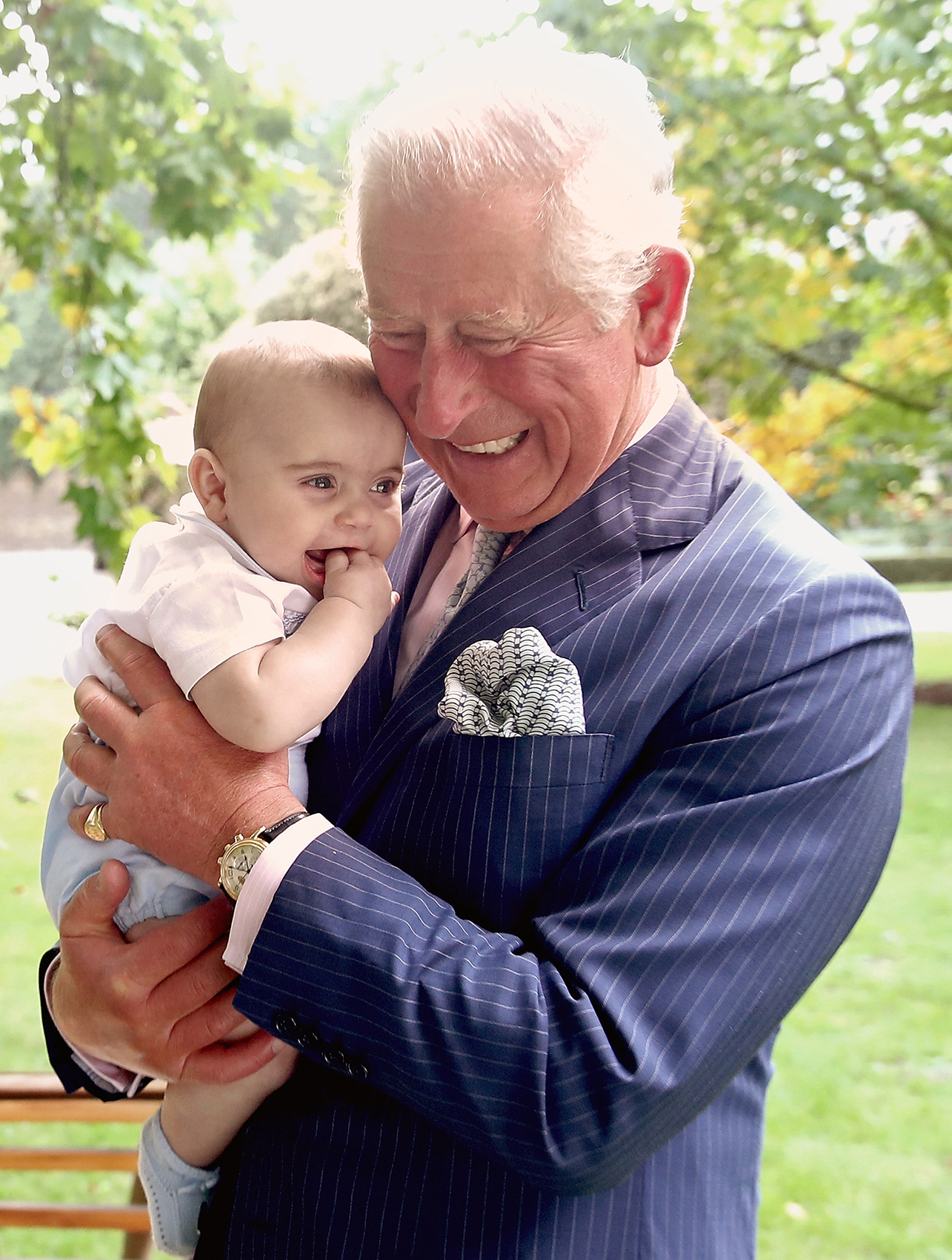  Prince Charles, Prince of Wales holds Prince Louis of Cambridge after a family portrait photo-shoot in the gardens of Clarence House, London.
Photo by Chris Jackson, 05 September 2018
 