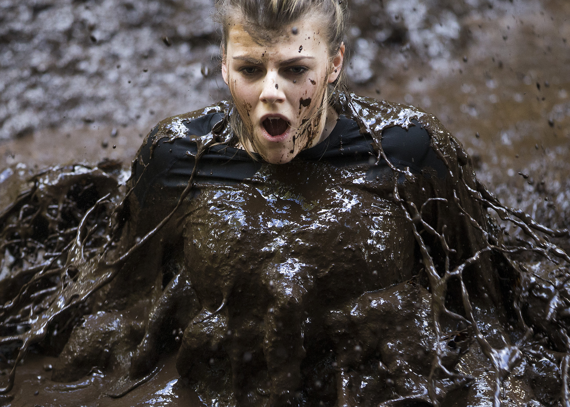  A contestant at Craufurdland estate in Fenwick taking part in the world's muddiest race, 'The Muddy Trials'. Competitors race through deep and dark gooey ditches, woodland trails and river crossings to get to the finishing line.
Photo by Michael McG