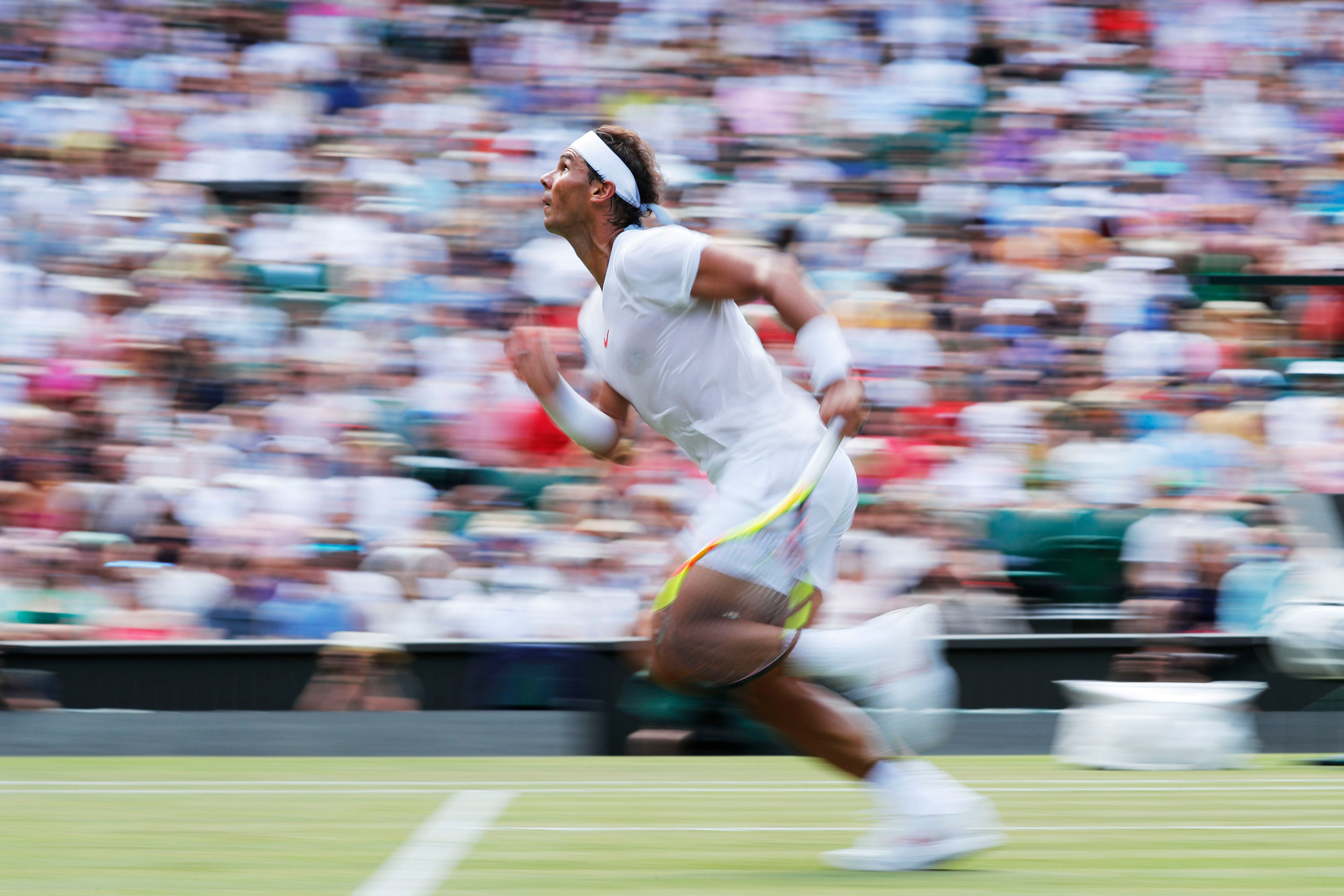  Rafael Nadal runs for the ball during a match with Alex de Minaur on centre court.
Photo by Heathcliff O'Malley, 07 July 2018
 