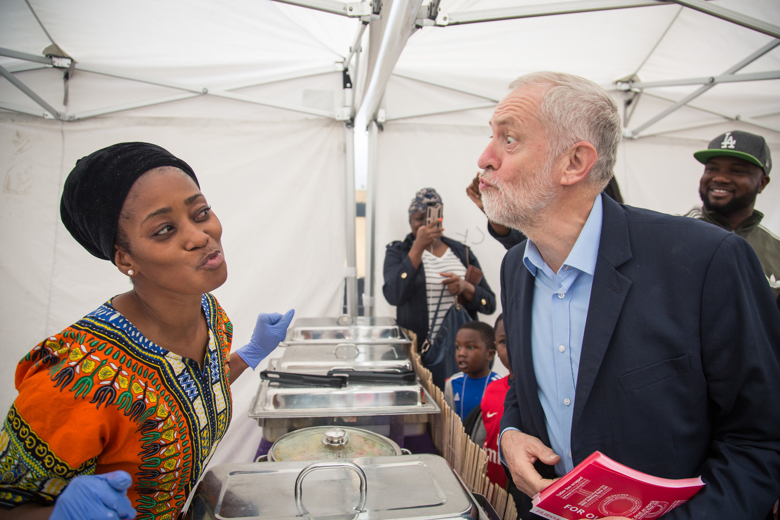  Jeremy Corbyn MP, leader of the Labour Party, greets a  local market trader in Grays Essex whilst meeting members of the public on a walkabout with the party faithful.
Photo by Manu Palomeque, 30 September 2017
 