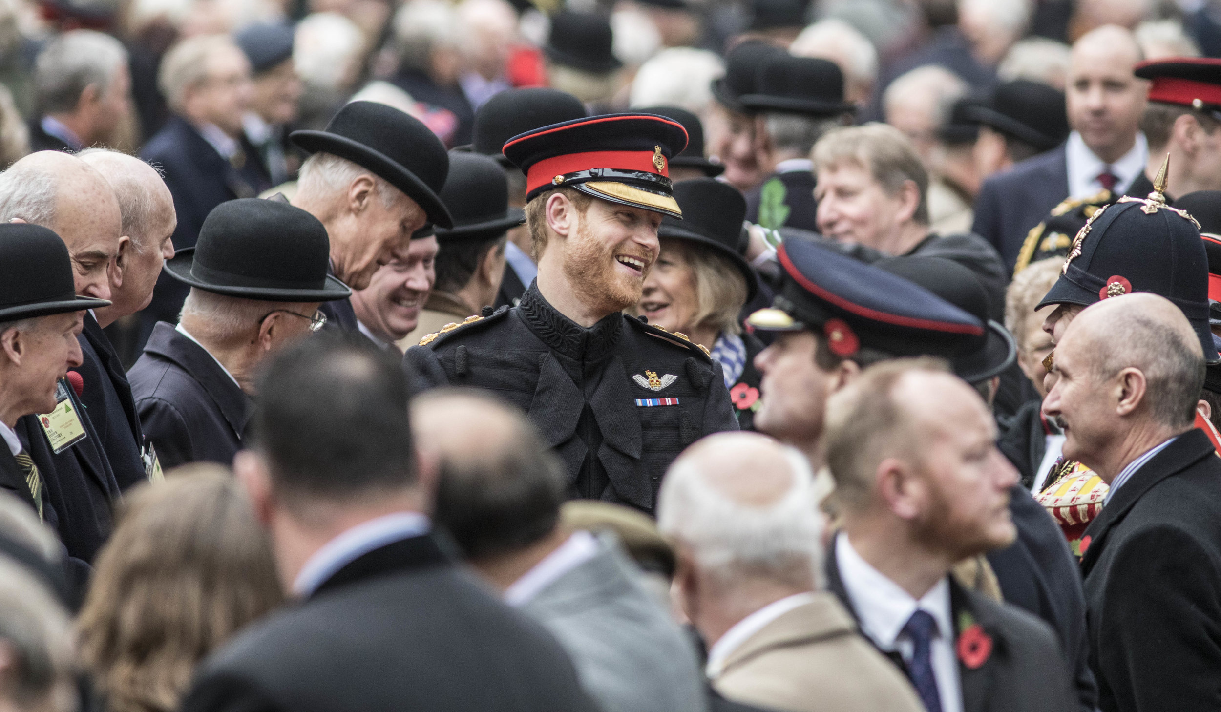  Prince Harry chats with veterans during the opening of the Garden of Remembrance at Westminster Abbey in London.
Photo by Richard Pohle, 09 November 2017
 