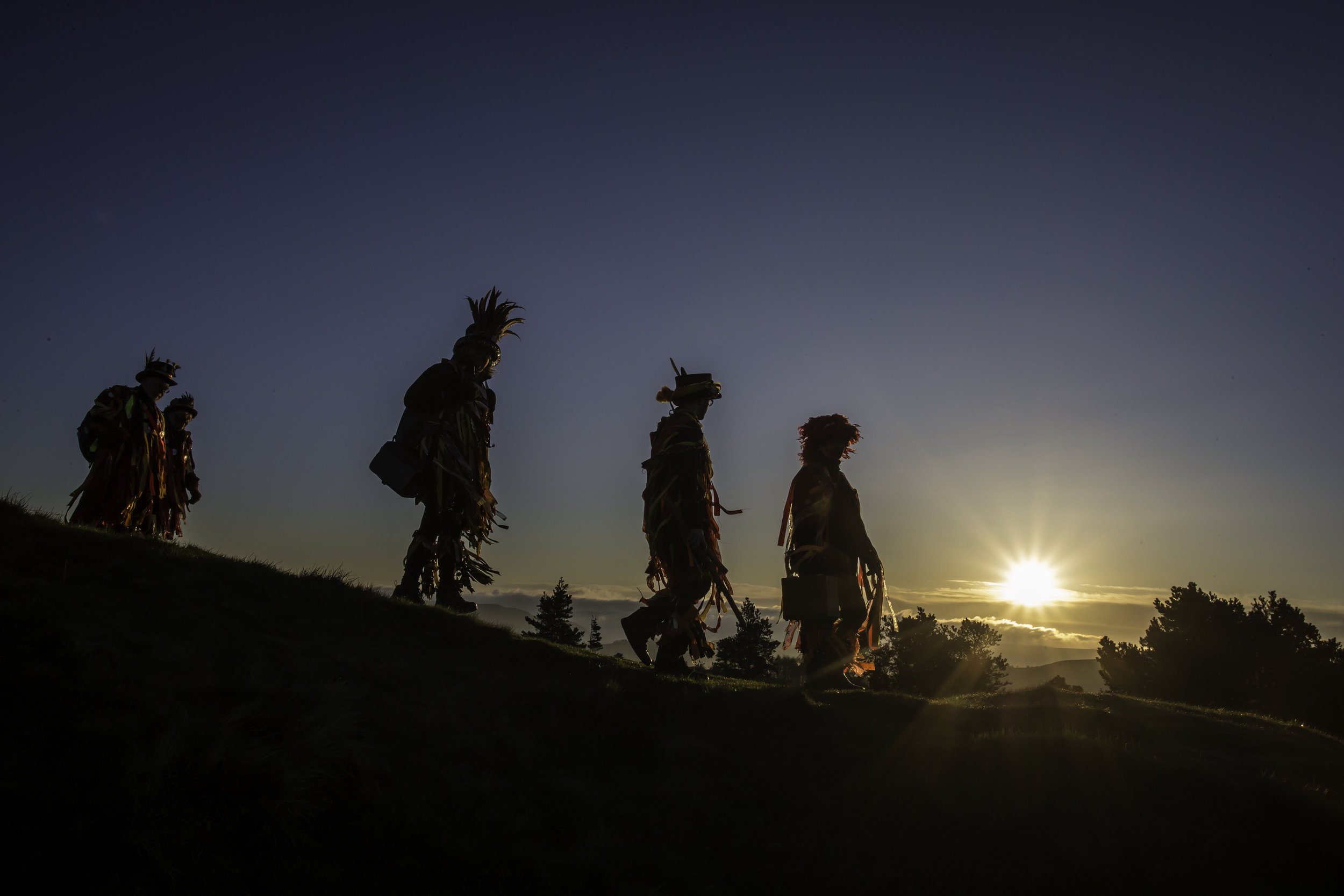  Morris Dancers celebrate May Day or 'Beltane' by dancing as the sun rises in Derbyshire, England as part of an ancient tradition, said to date back to pagan times.
Photo by Lindsey Parnaby, 01 May 2018
 