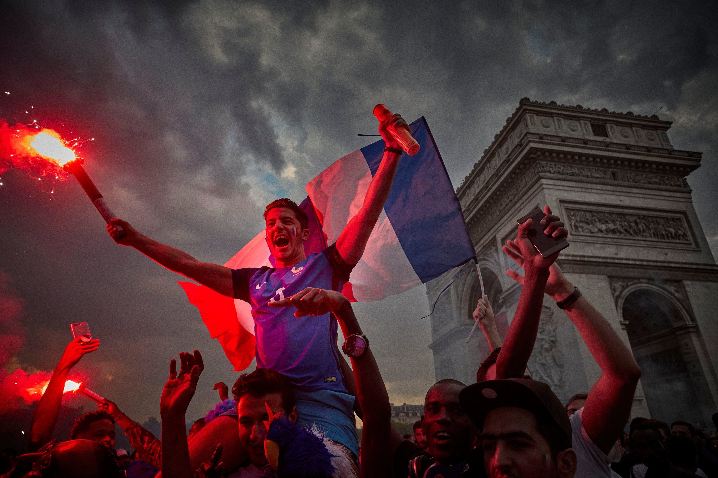  Fans the Arc de Triomph in Paris celebrate the French football team winning the 2018 FIFA World Cup, 20 years after they last won it. 
Photo by Kiran Ridley, 15 July 2018
 