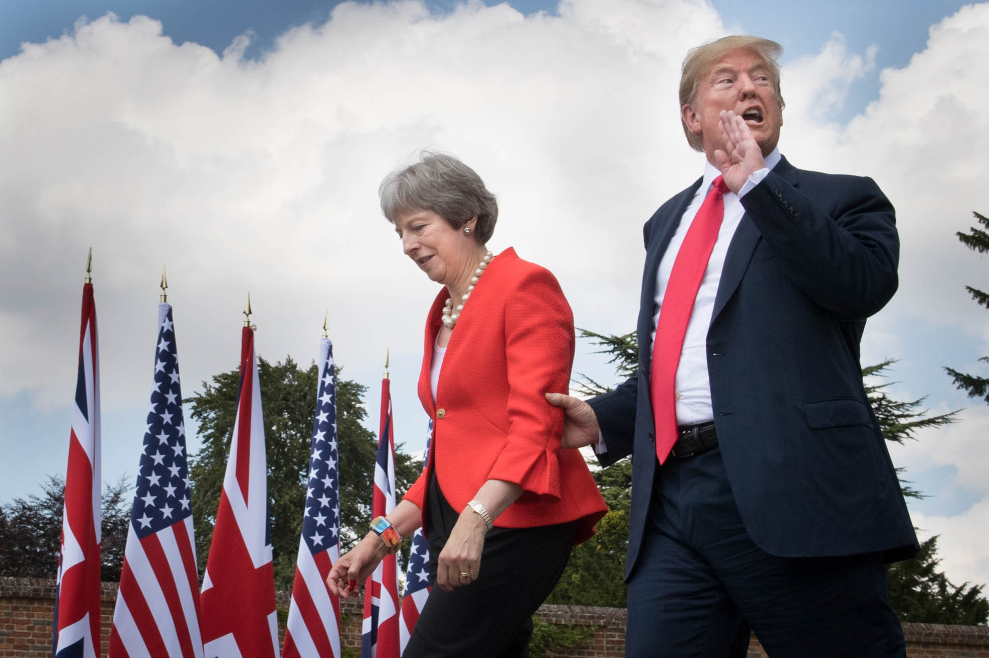  British Prime Minister Theresa May and U.S. President Donald Trump leave a press conference at Chequers in Buckinghamshire where they held earlier bilateral meetings. 
Photo by Stefan Rousseau, 13 July 2018
 