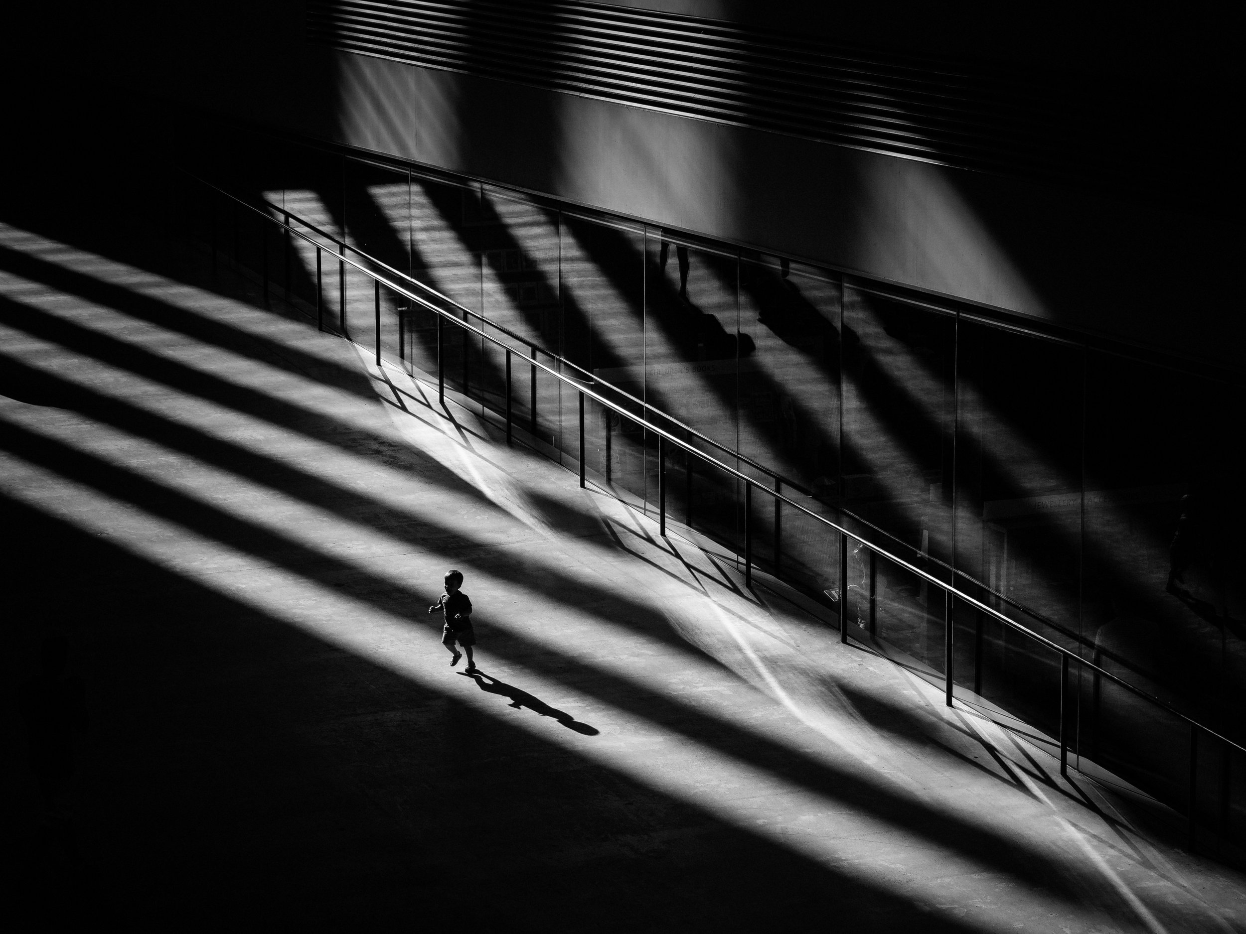  A child runs around during a heat wave bank holiday, whilst bathed in rays of sunlight in the turbine hall of the Tate Modern, Bankside, London.
Photo by Edmond Terakopian, 06 May 2018
 