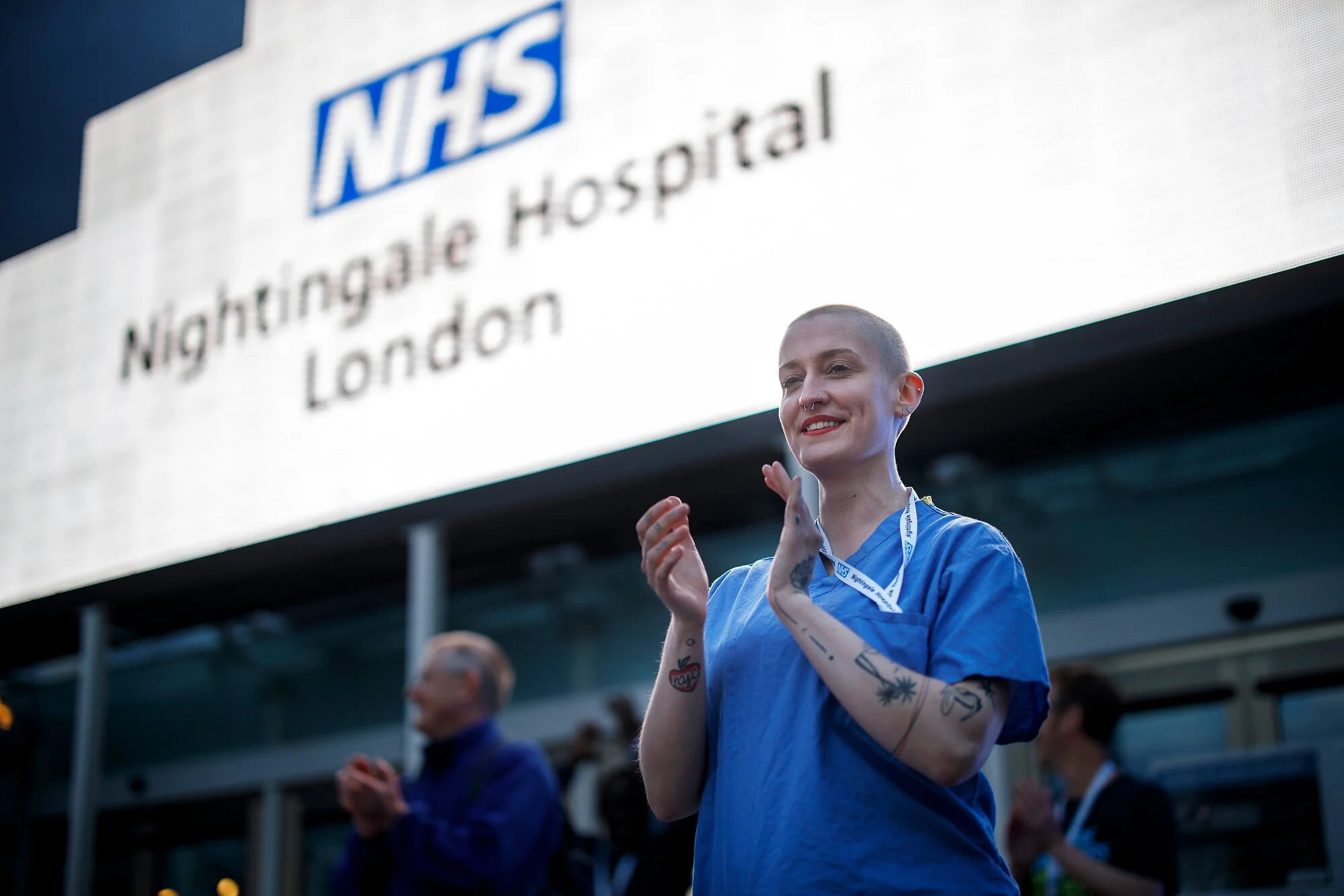 Medical staff at a Nightingale Hospital at ExCel London take part in a national "clap for carers" to show thanks for the work of Britain's NHS workers and other frontline medical staff around the country as they battle with the novel coronavirus pan