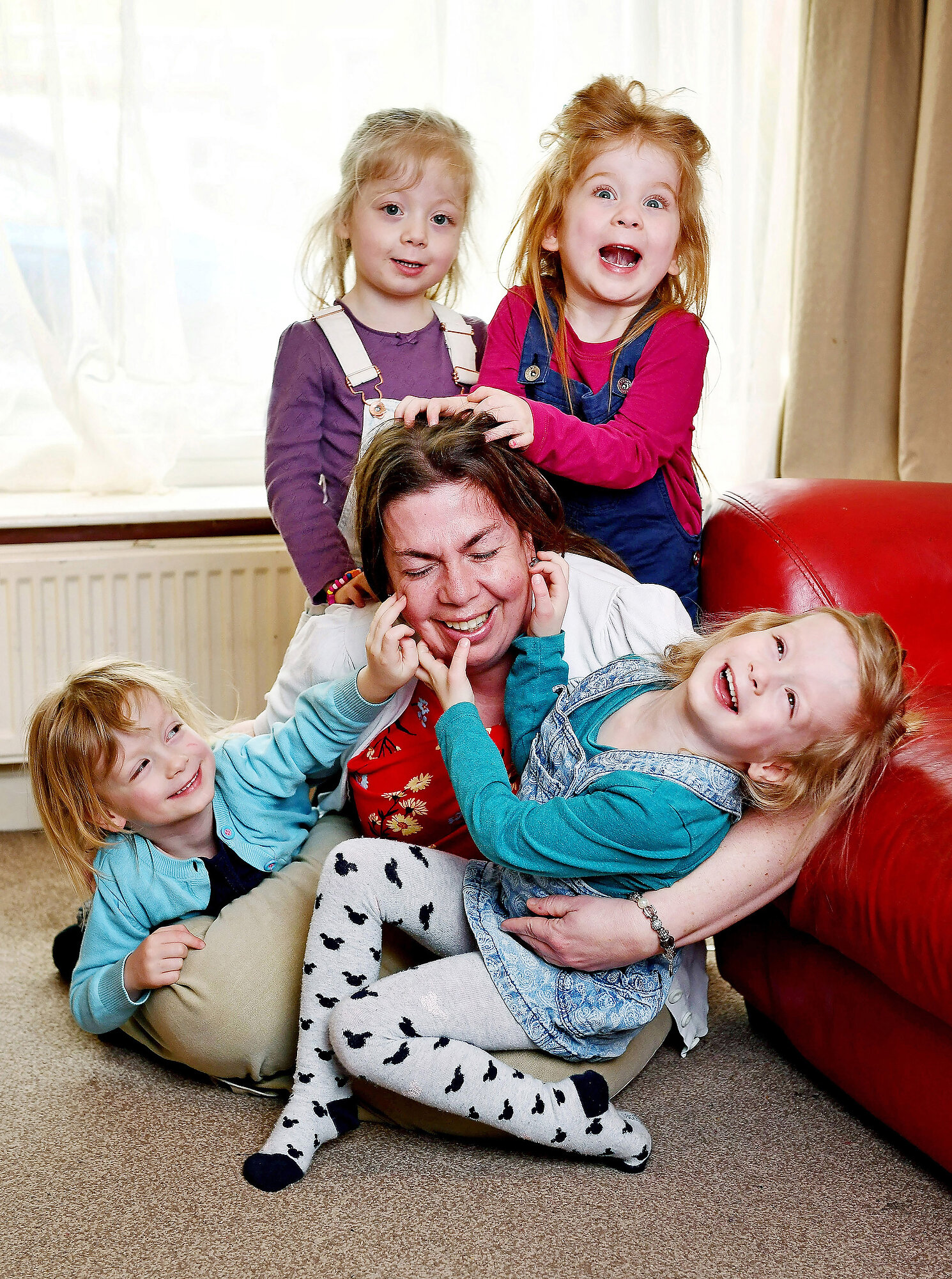  Christine Clark celebrates they fifth birthday with her IVF quadruplets Alexis, Elisha,Caroline and Darcy at their home in Rotherham, South Yorkshire.  Photo: Bruce Adams/Daily Mail, 07 April 2018 