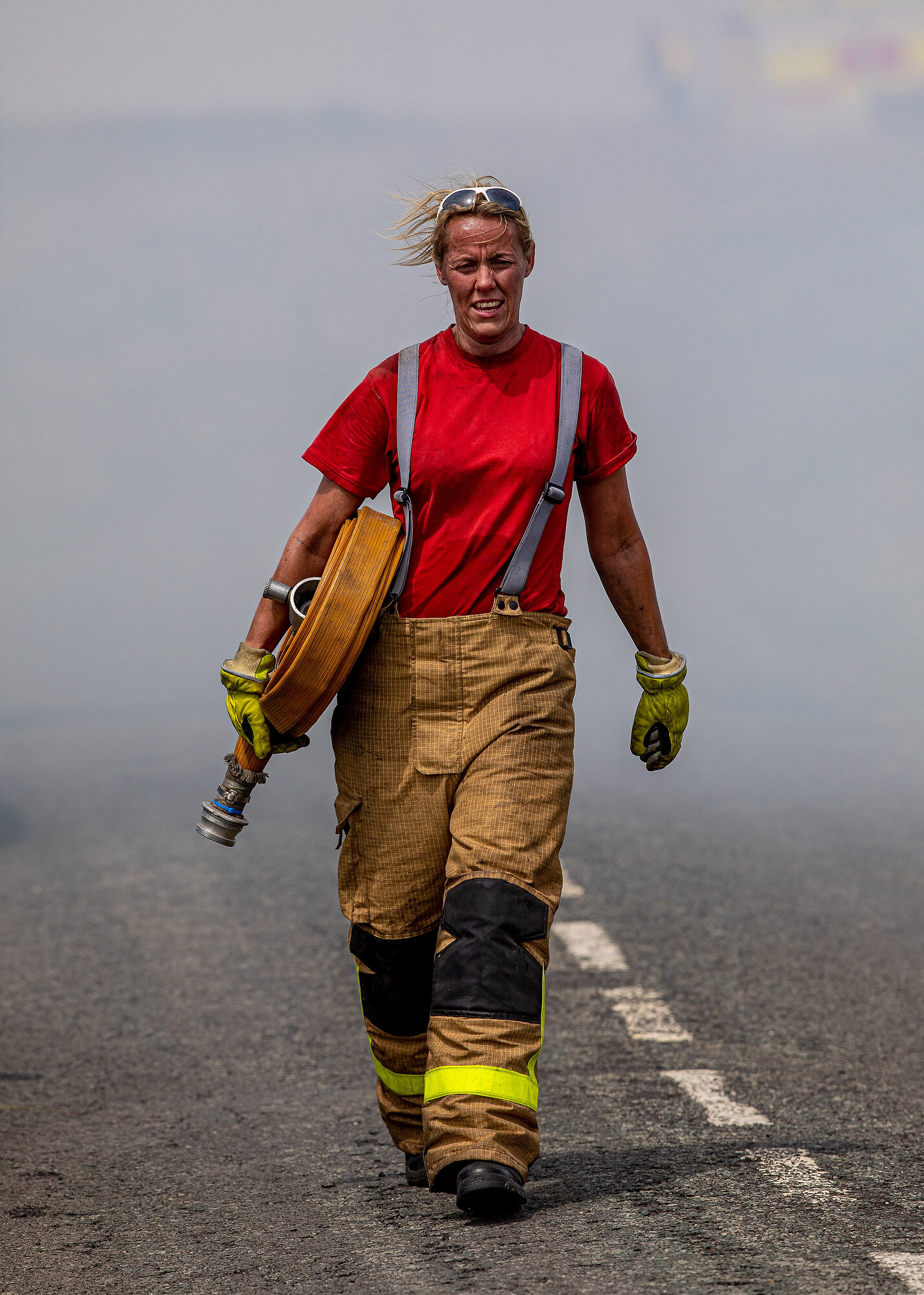  A firefighter from the Lancashire Fire Service seen whilst tackling the Winterhill bush fires which were started by an arsonist. Photo: Charlotte Graham, 01 July 2018 