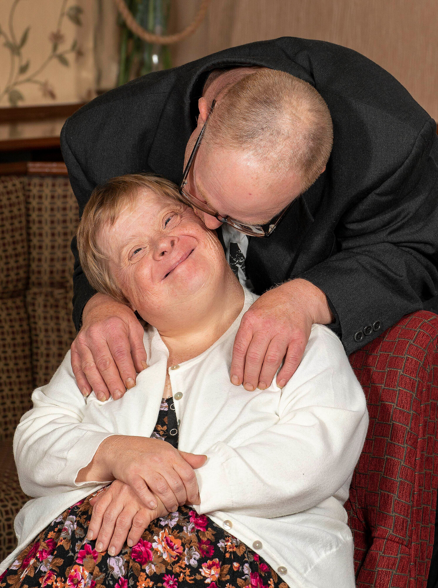 Deana Tobias enjoys a kiss from her husband Gareth. The couple have been married for 28 years and are the world’s longest married downs syndrome couple. Photo: Richard Rayner, 26 August 2020 