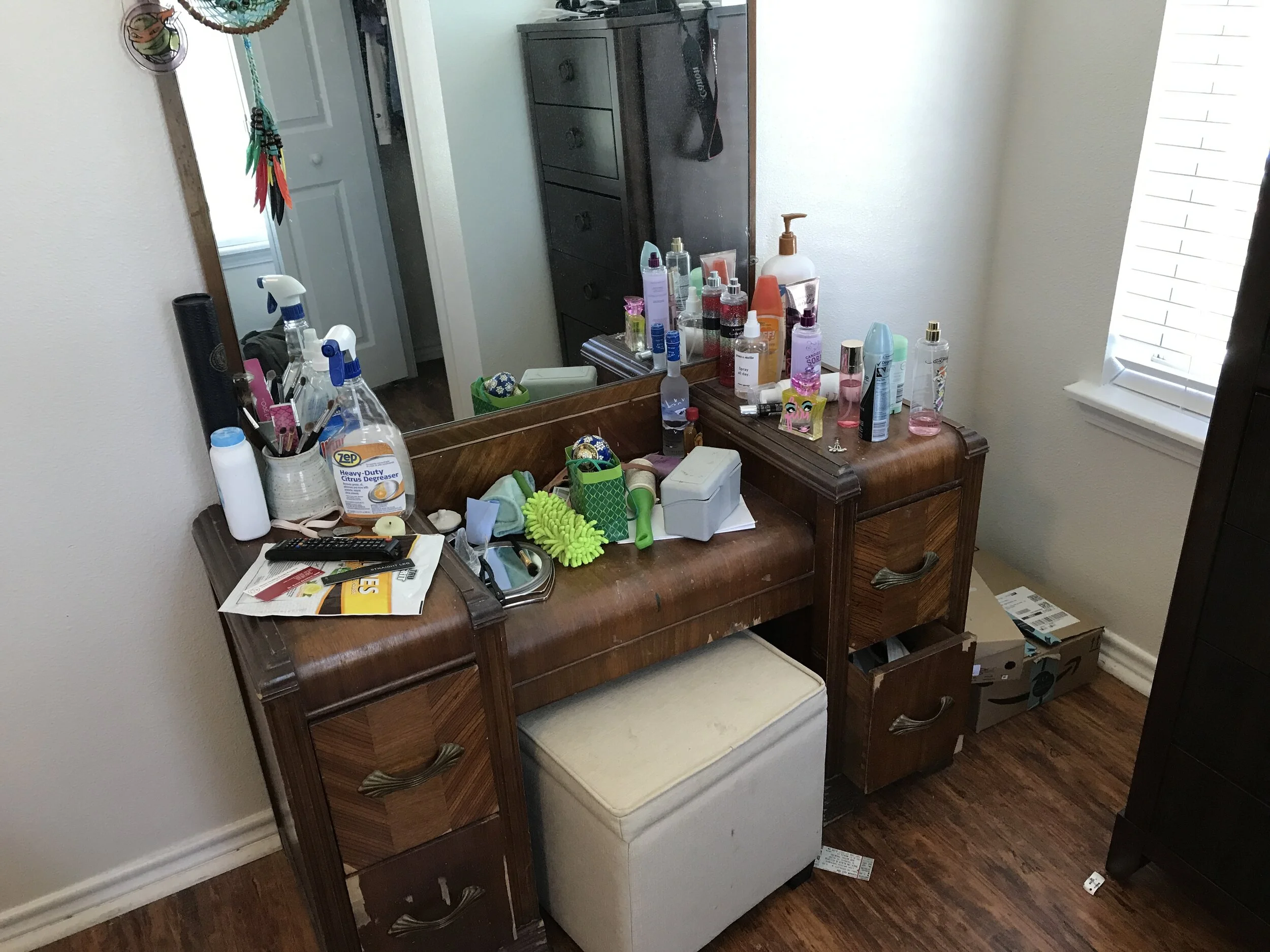 Before picture, cluttered vanity in San Antonio