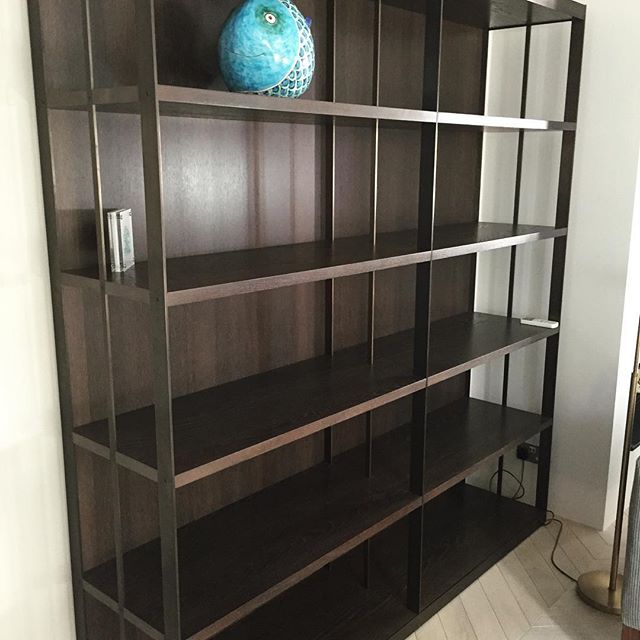 Bespoke bookcase design in bronze and walnut